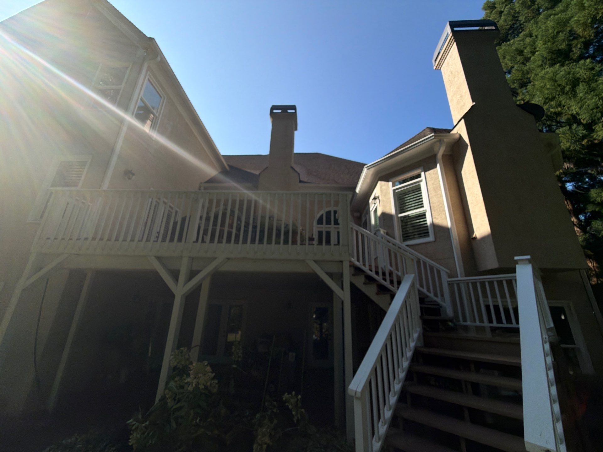 Multi-Story Stucco Home Exterior Painting and Garage Refresh in Marietta by Swift Home Renovations 