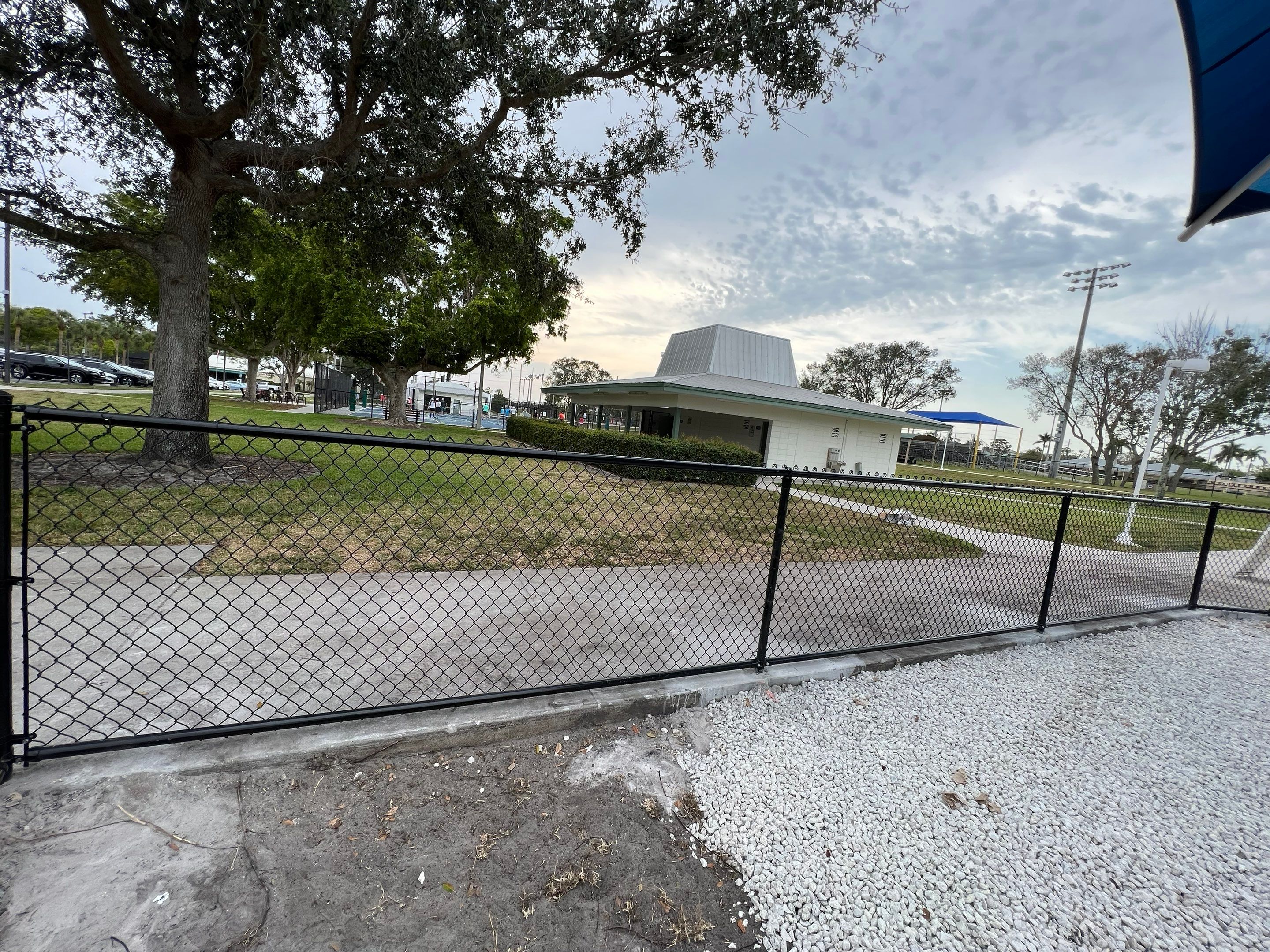 Vinyl Coated Chain-link fence for the City of Naples around Fleischmann Park Playground.  by Asap fence and gates, LLC