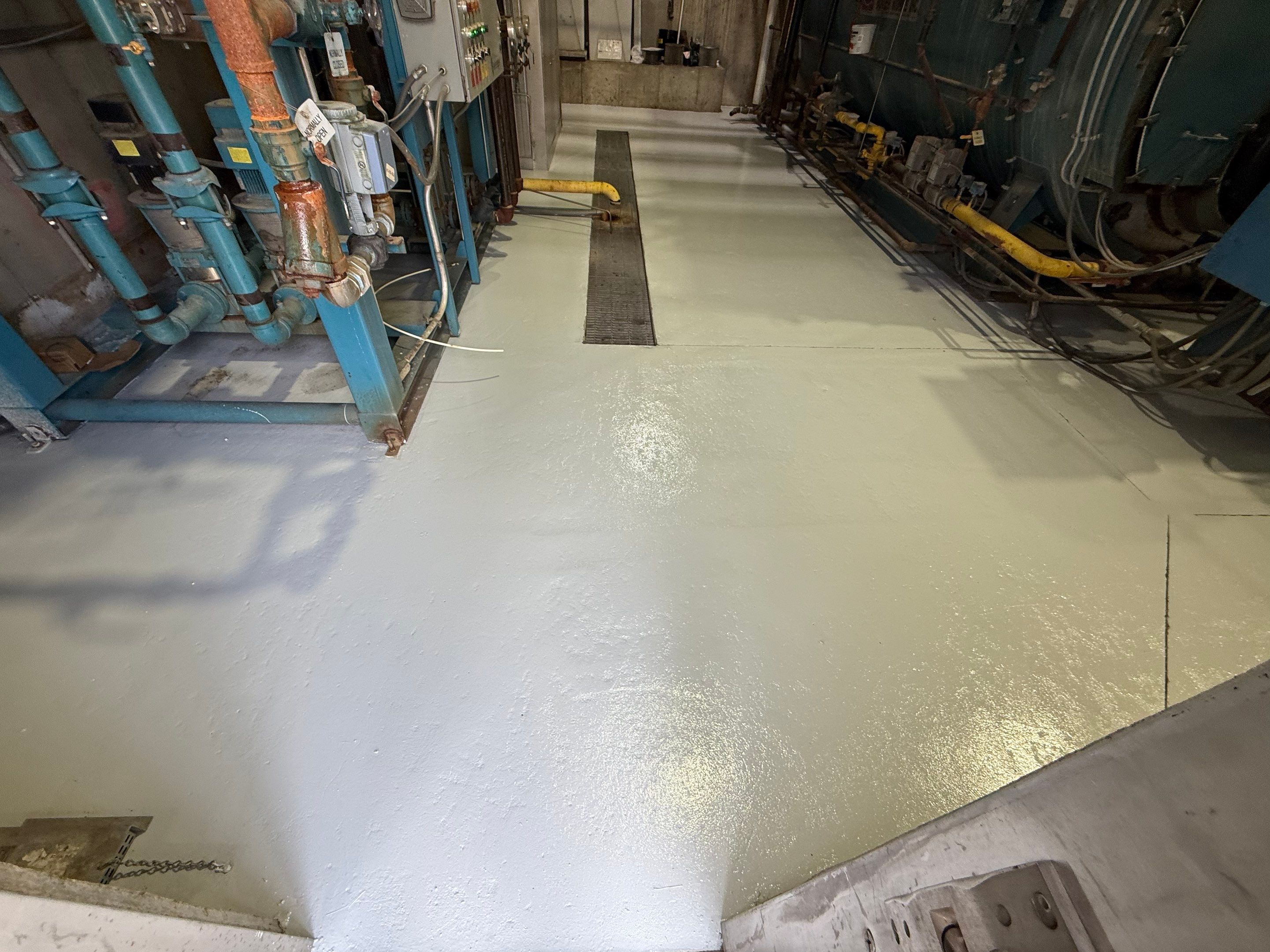 Industrial Epoxy Floor Coating for Perdue Premium Meat Co in Sioux Center by Select Painting, Coatings & Garage Cabinets