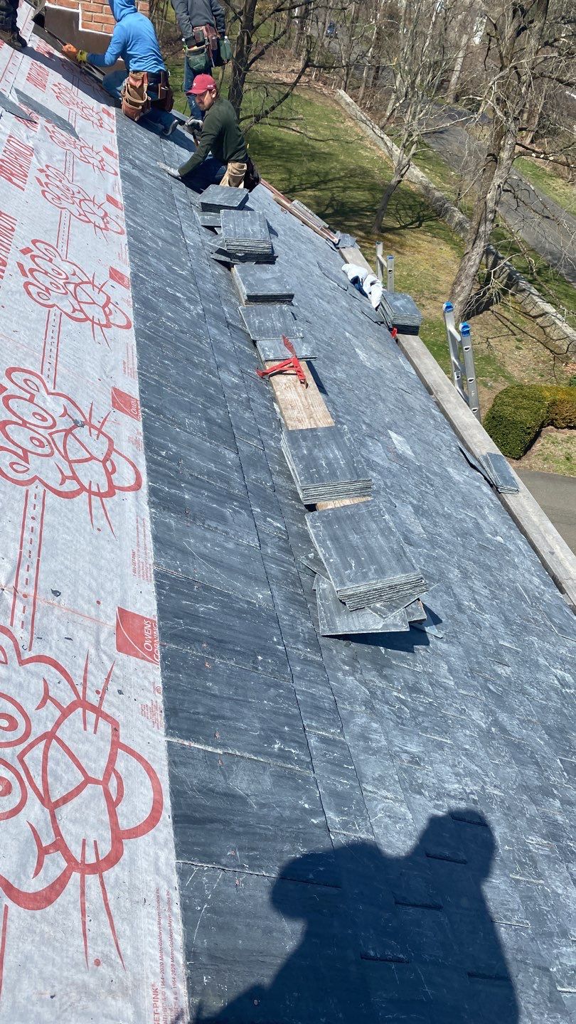 Residential Roofing Installation using Vermont Slate by A Plus Exterior
