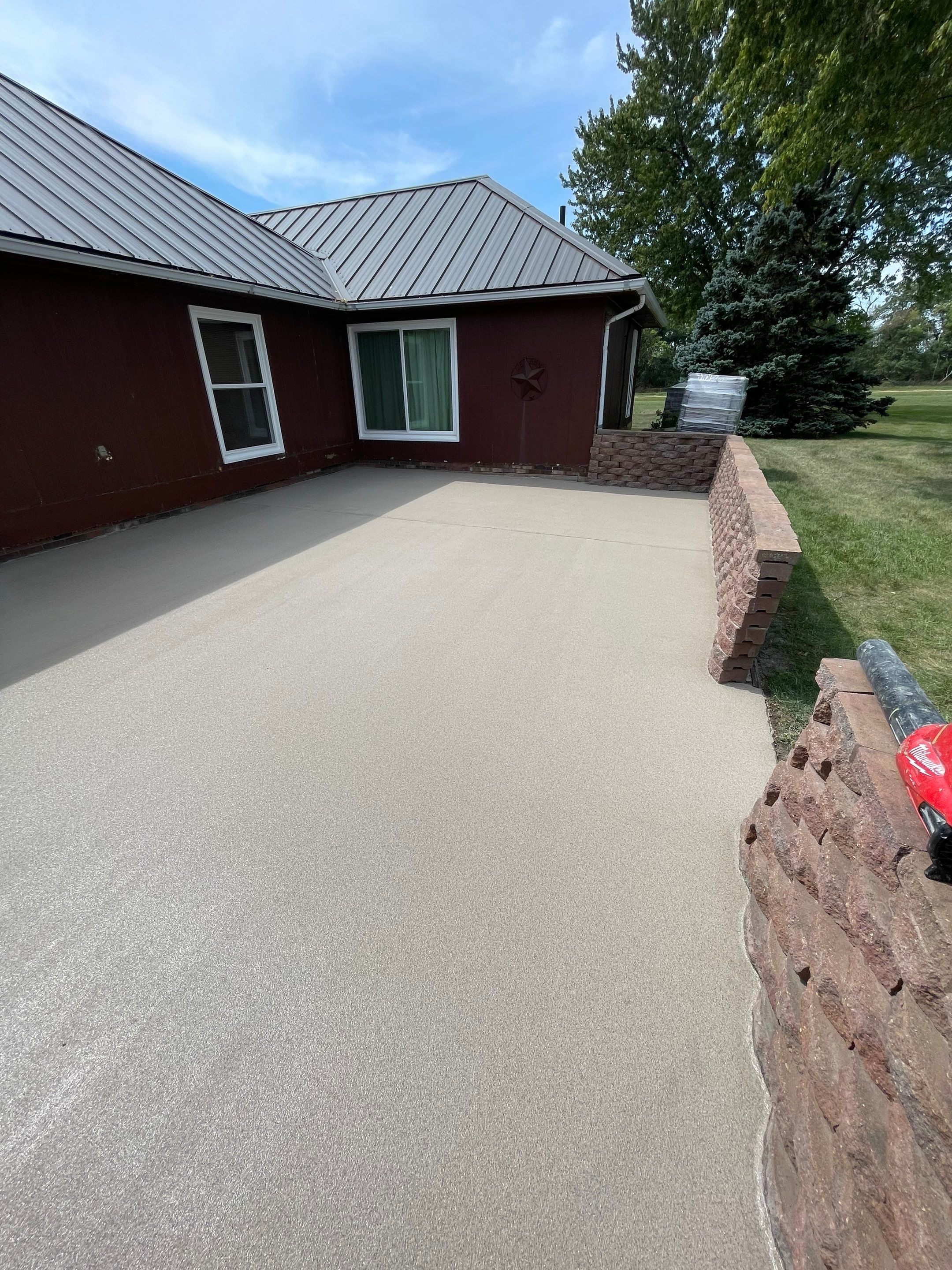 Concrete Patio Resurfacing and Protective Coating in Winfred, South Dakota by Select Painting, Coatings & Garage Cabinets