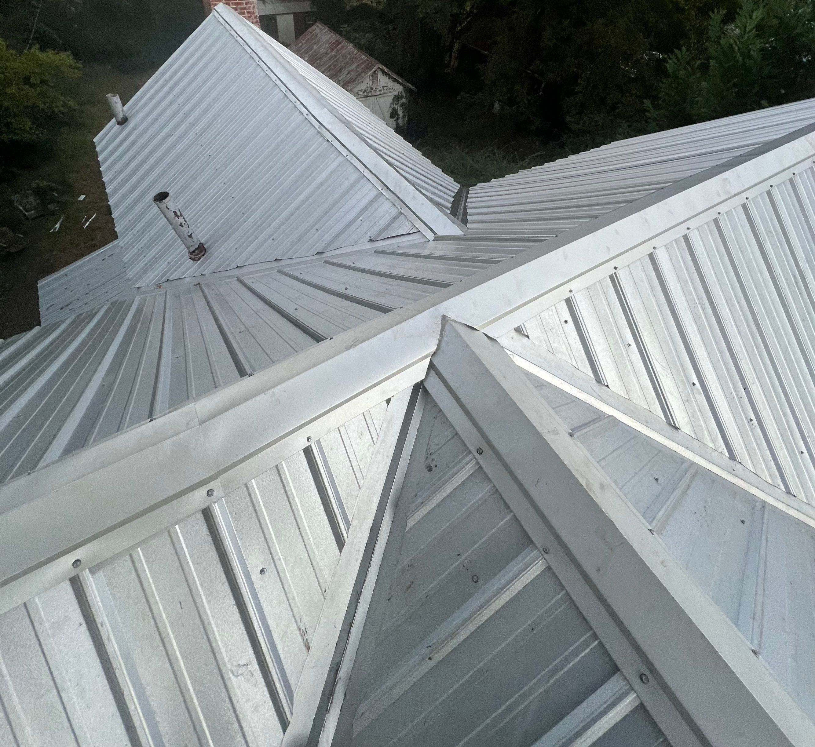 Residential Roofing Installation using 26 Gauge Metal by The Roofing Dudes