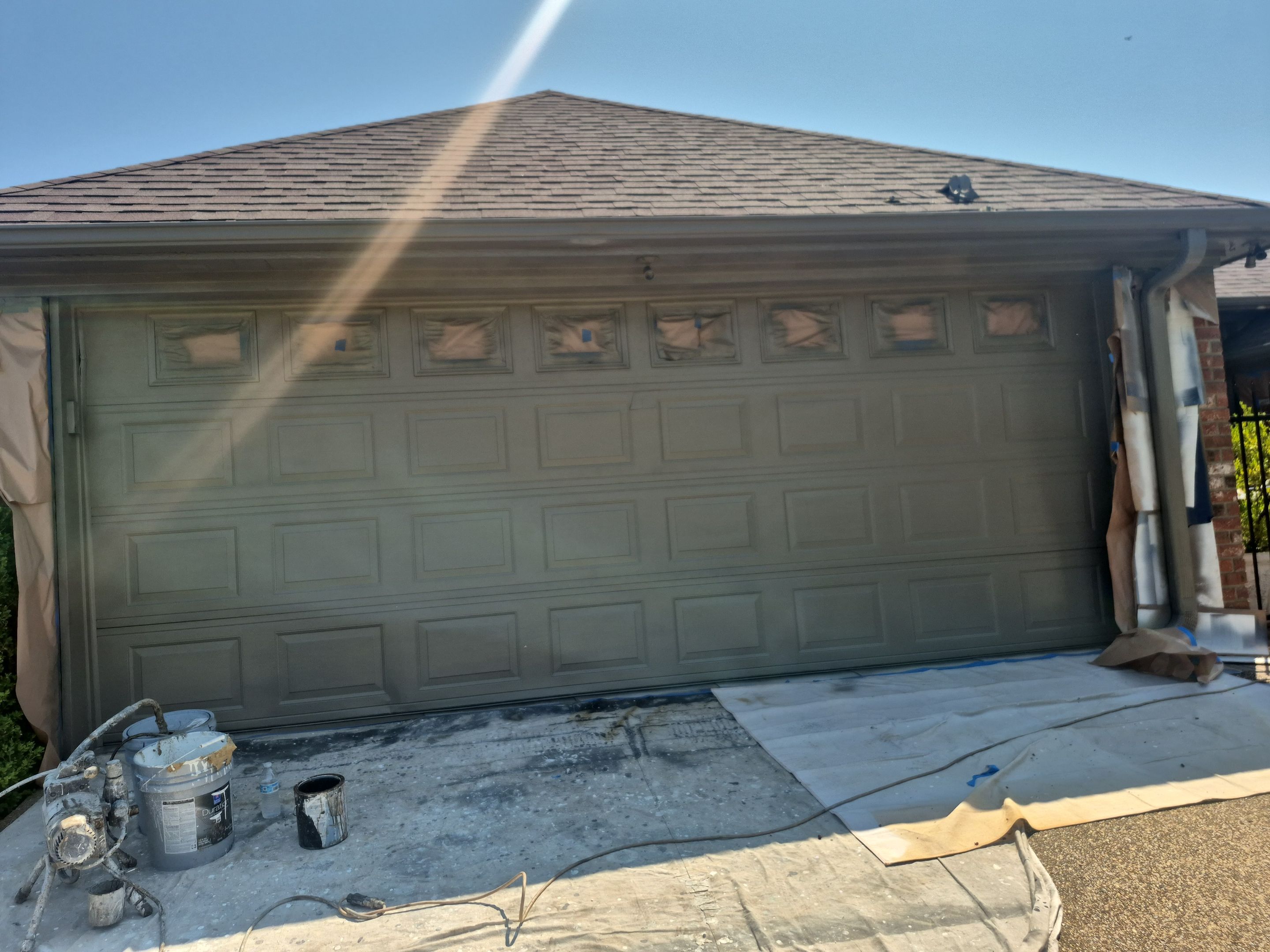 Exterior Painting in Longview, TX | Fresh Garage Door & Fence Renewal by Quality Coats Painting