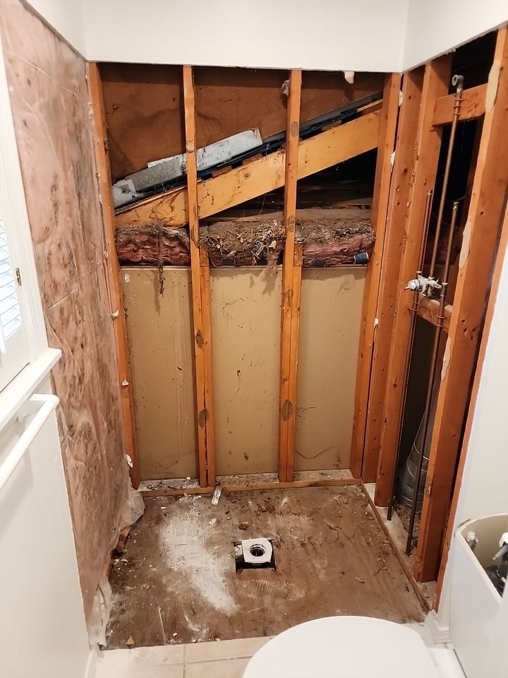 New shower, flooring, and countertop by The Shower Company