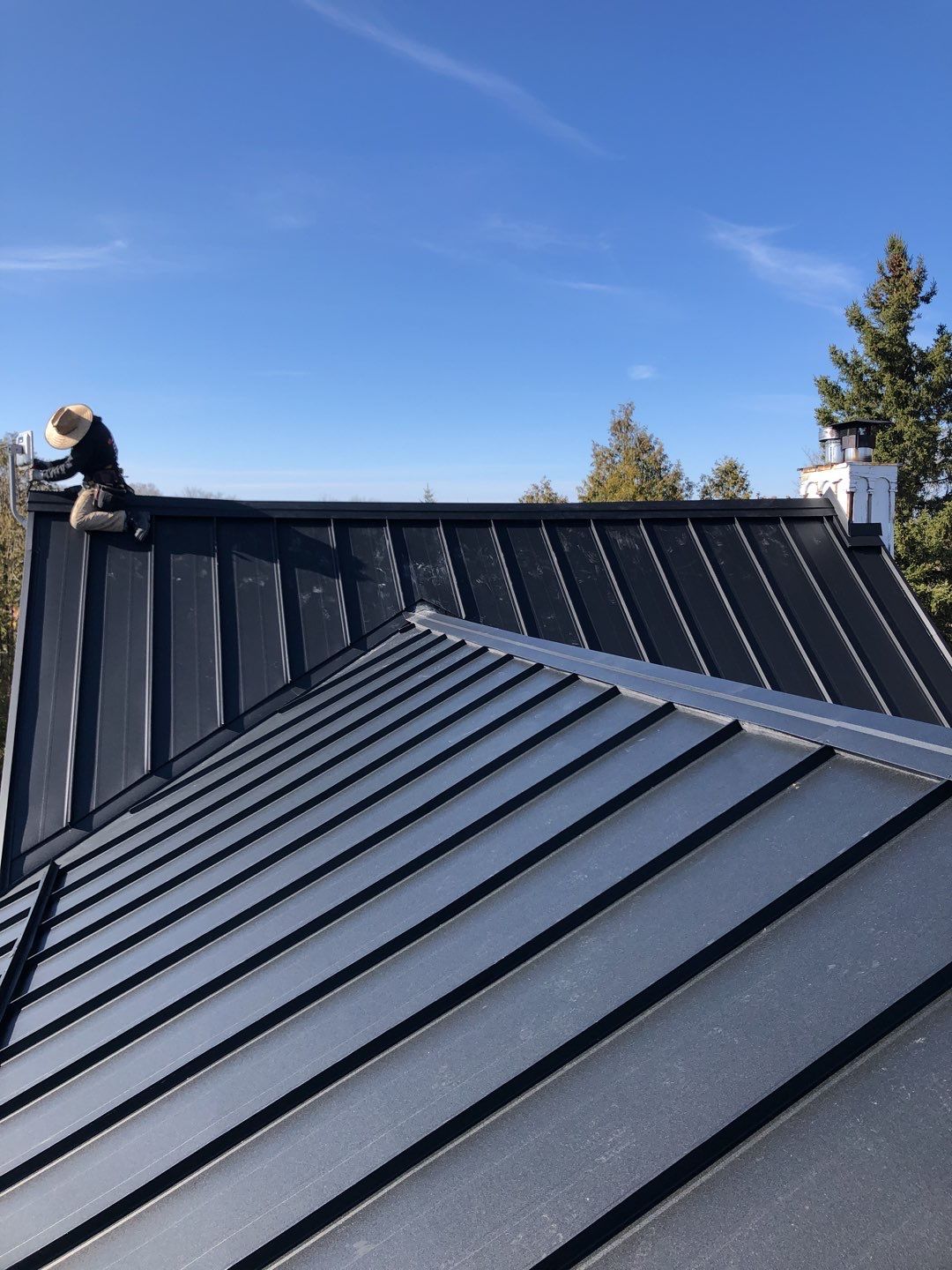 Residential Roofing Installation using 16" Standing Seam Panels by Jay Carter Roofing & Sheet Metal
