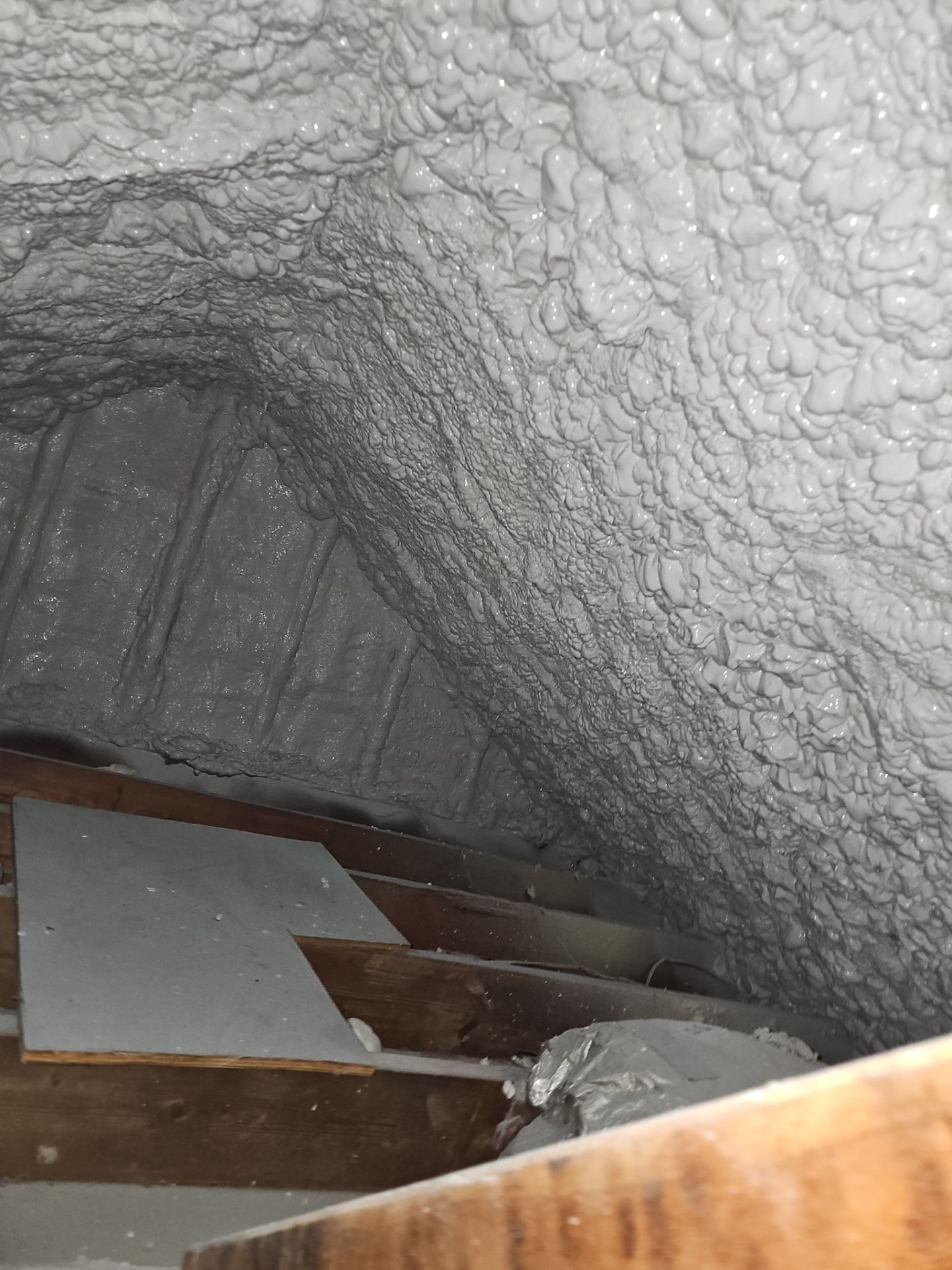 Attic Retrofit using open cell spray foam by NYS Foam & Energy