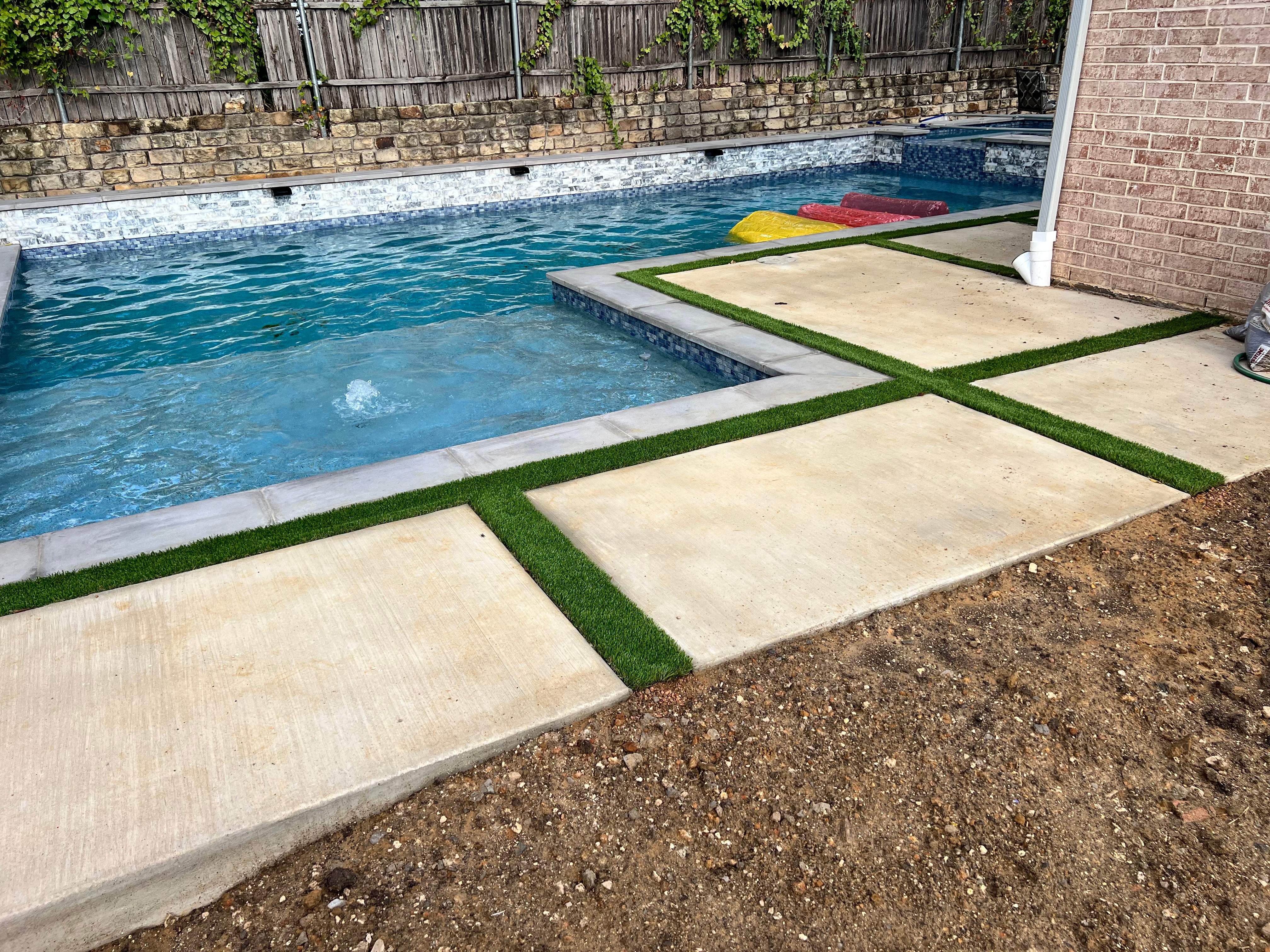 Geometric Pool with Raised Spa and Stone Decking by Pinnacle Pools and Spas - DFW