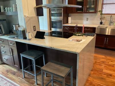 San Antonio Kitchen and Bathroom Remodel Featuring Marble-Patterned Tiles