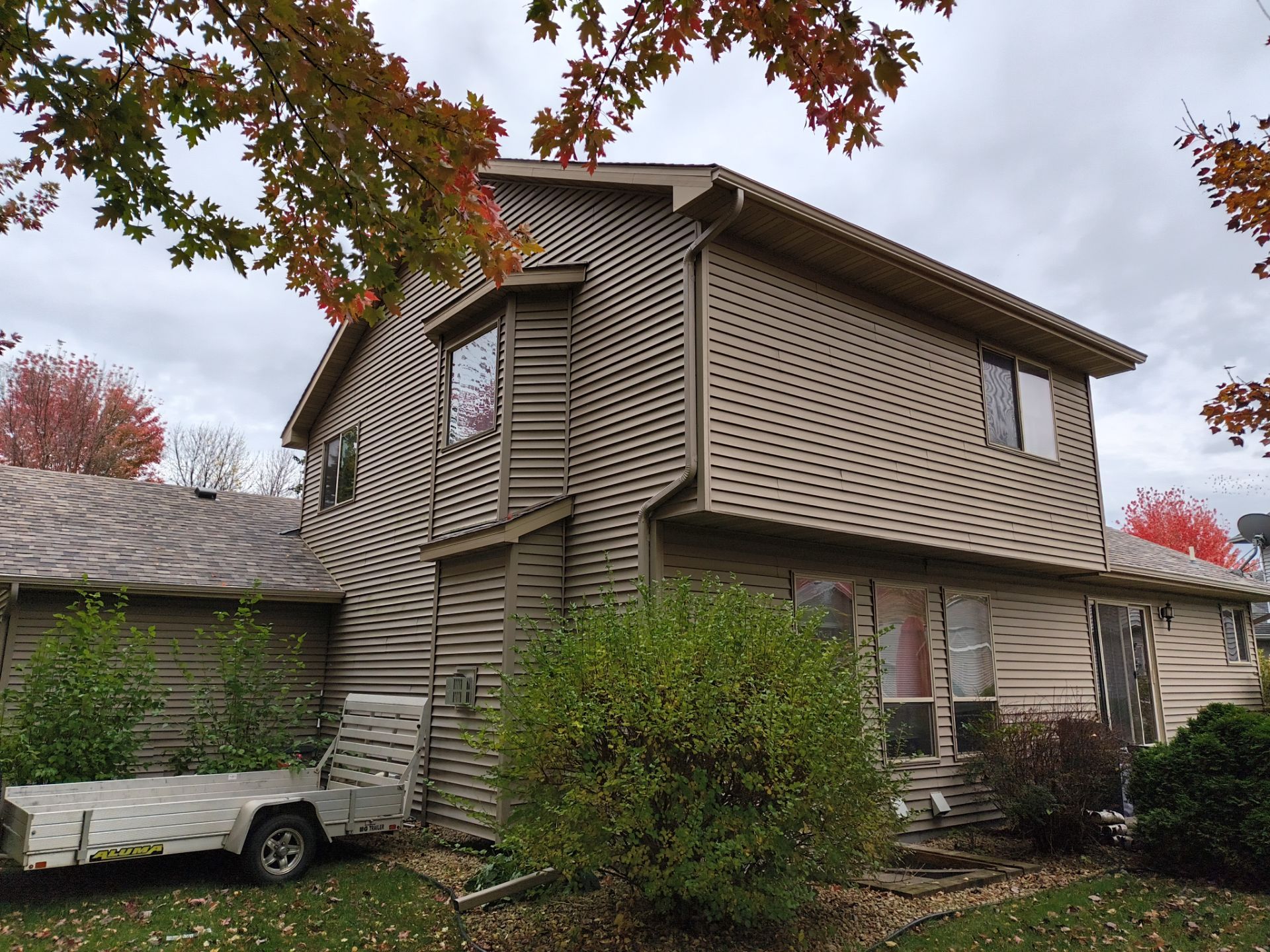 5" Gutter Installation with Leaf Protection Reinstalled – Waconia, MN by Next Level Seamless Gutters / Exteriors Inc.