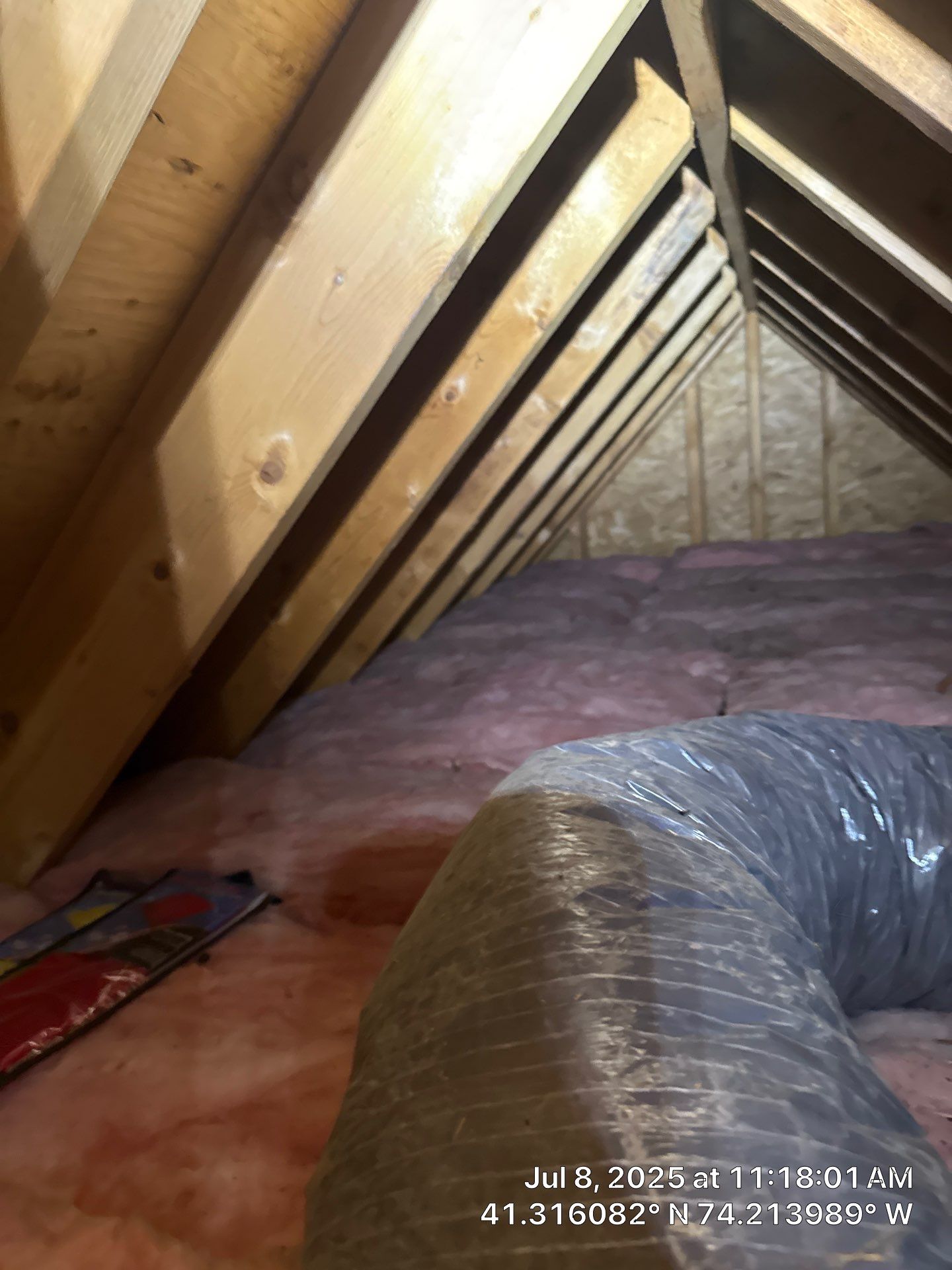 Attic Insulation using open cell spray foam by NYS Foam & Energy