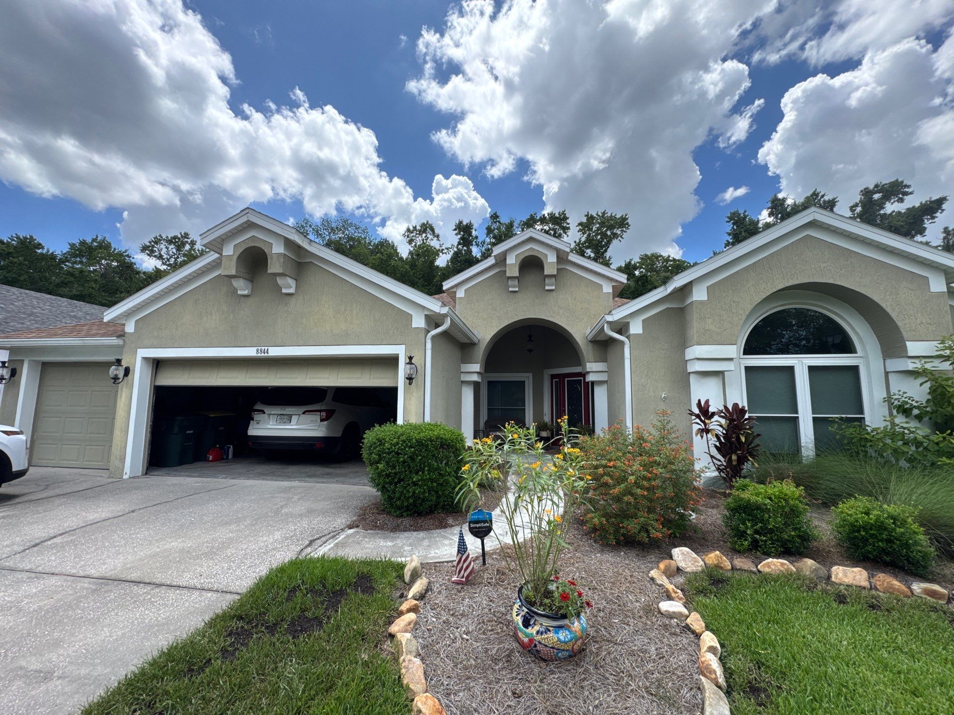 Stucco Exterior Repainting with White Soffits & Fascia | Hampton Park, Jacksonville, FL by A New Leaf Painting, LLC