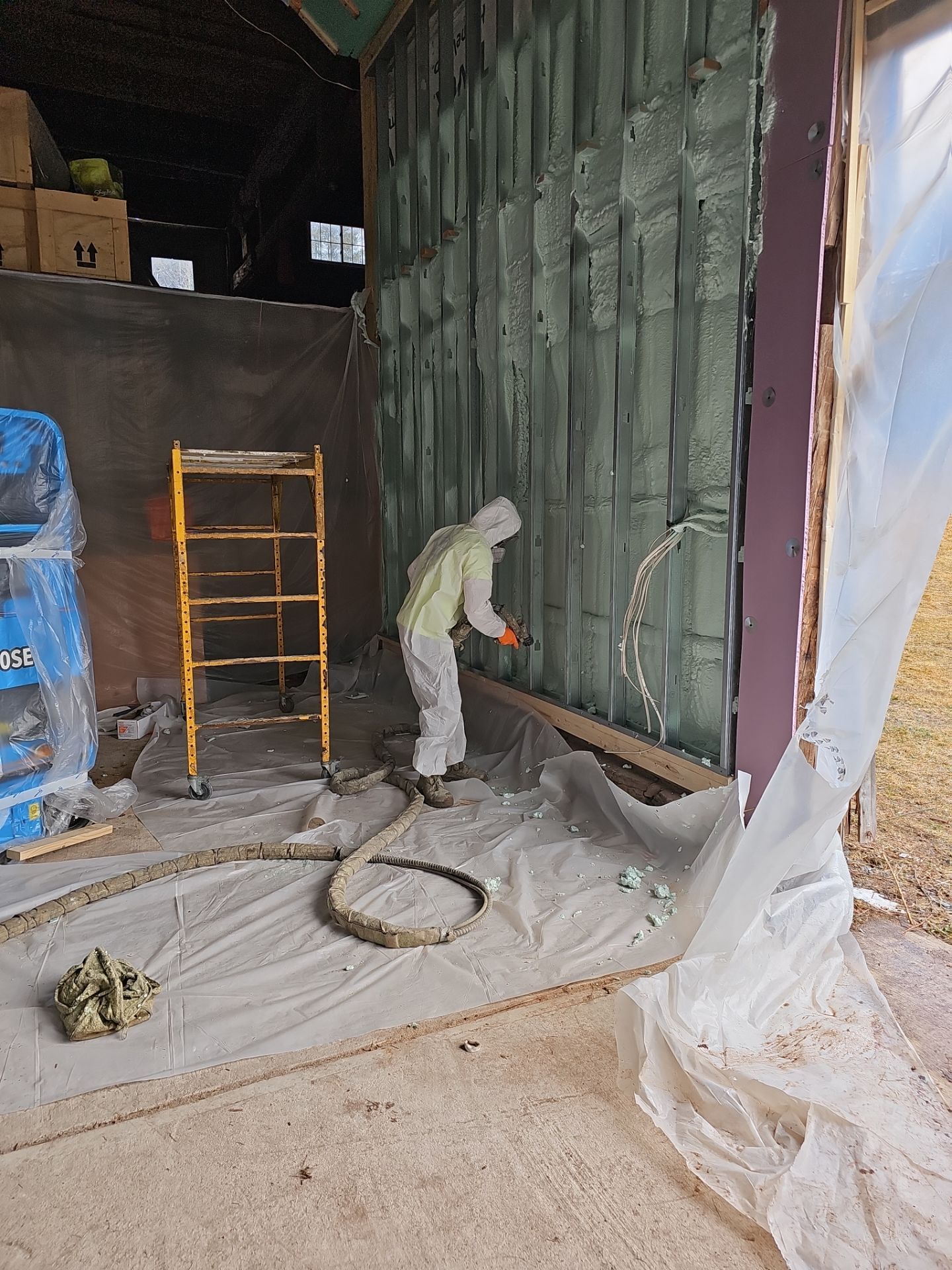 Exterior Installation using Closed Cell Spray Foam by NYS Foam & Energy