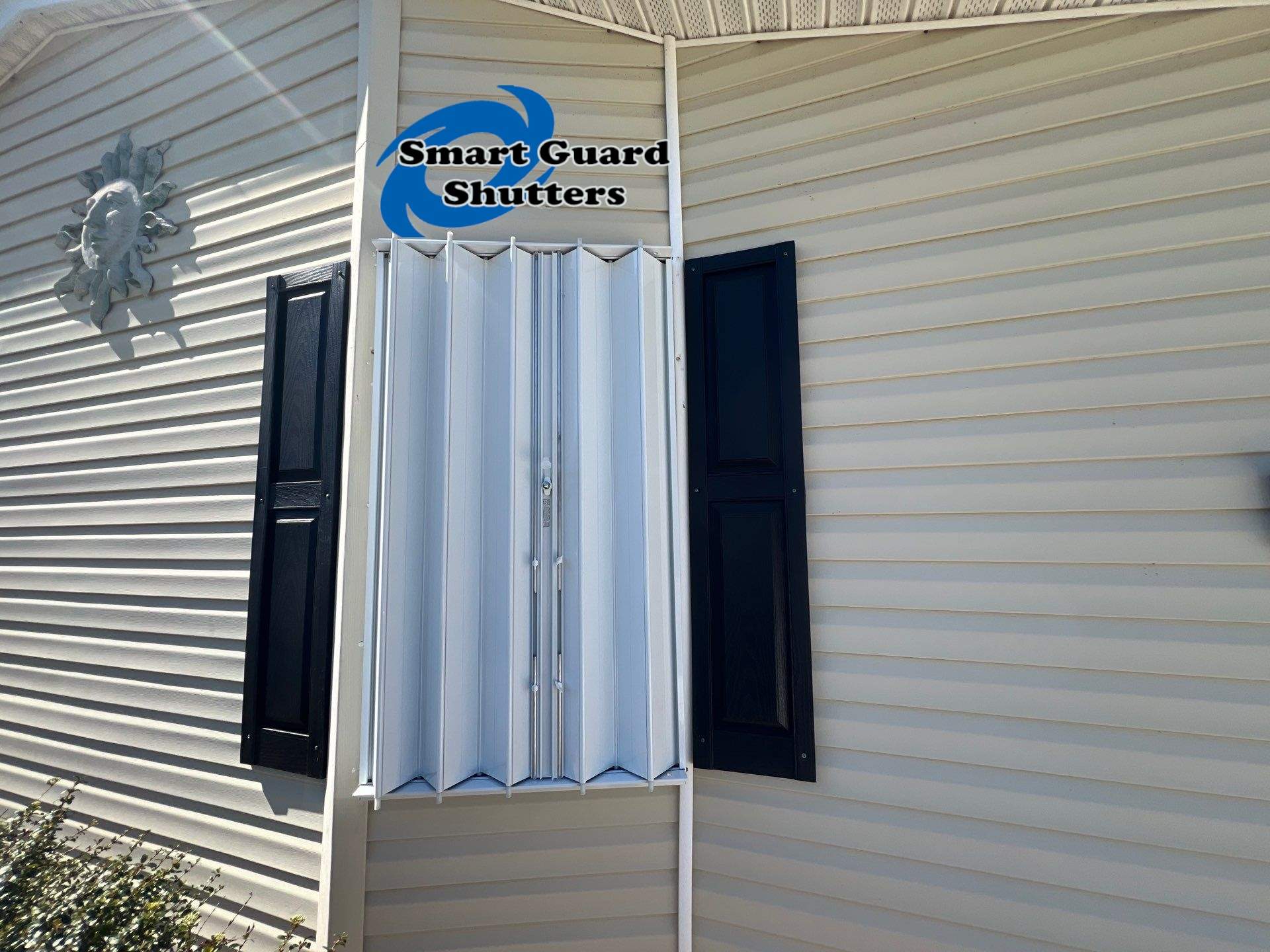Accordion Shutters & Hurricane Fabric by Smart Guard Shutters