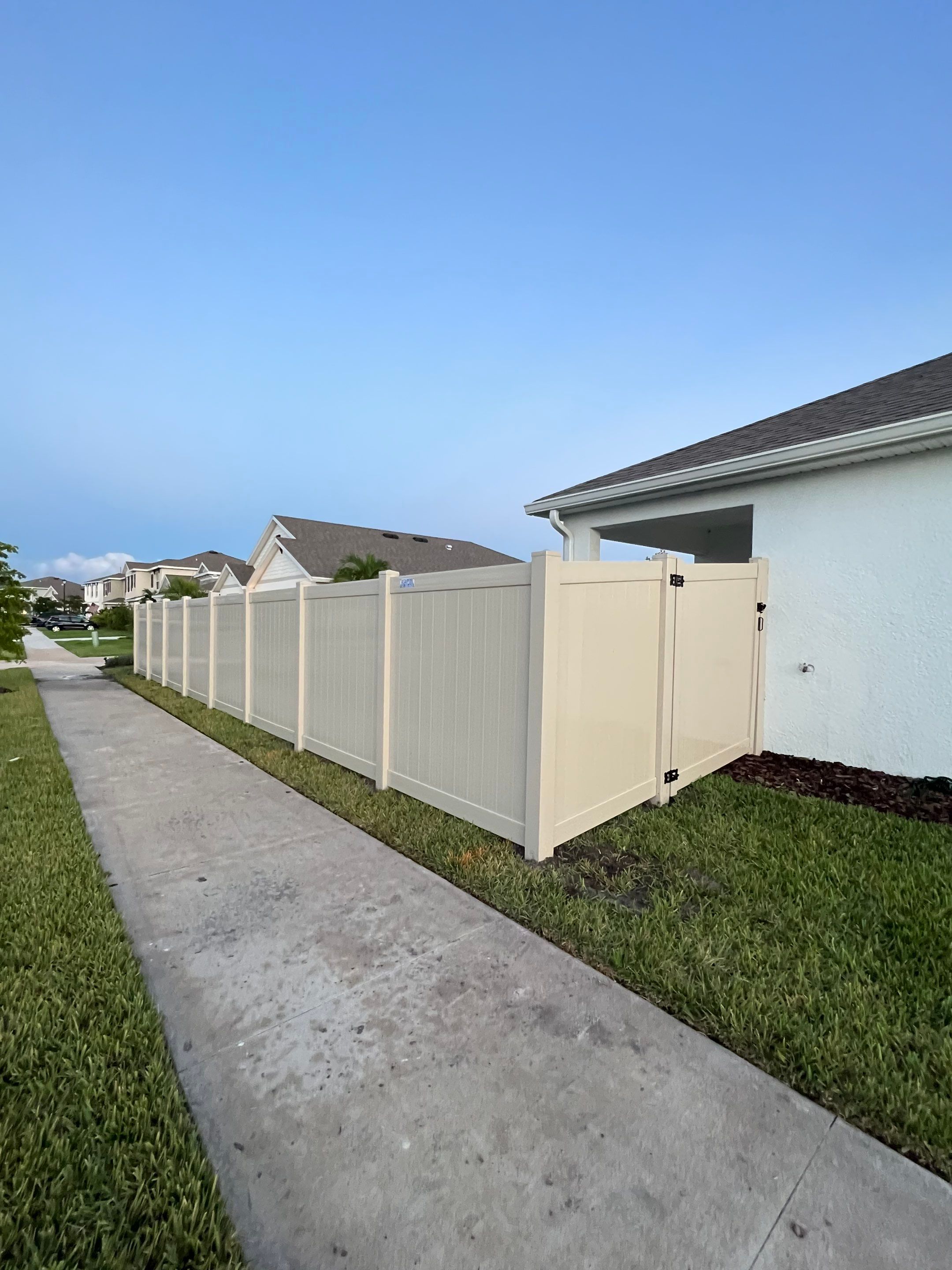 Vinyl Fence Installation using Tan Vinyl Privacy Fence by Asap fence and gates, LLC