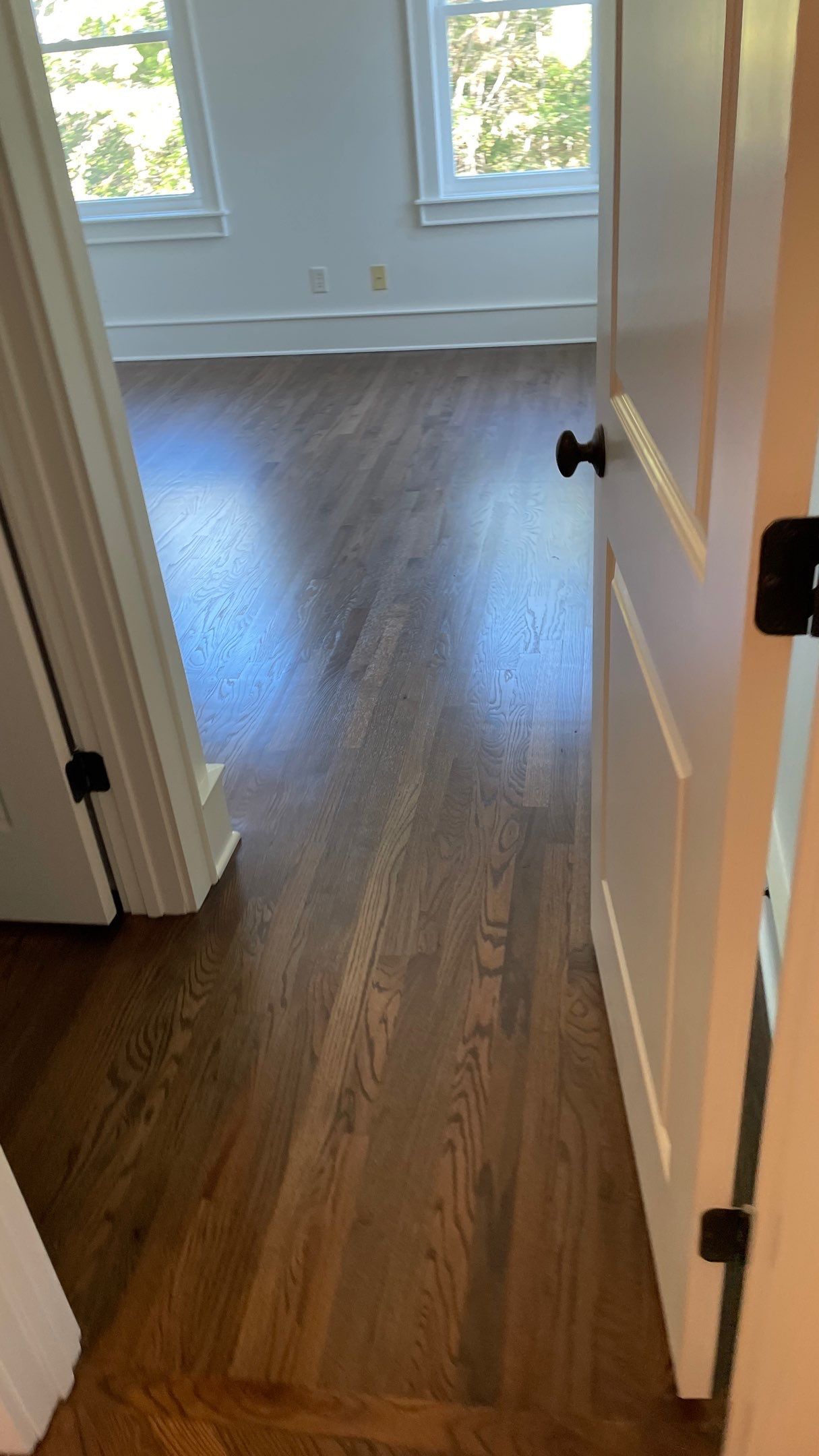 Herringbone Wood Hallway and Rooms by Footprints Floors of Coastal Carolina
