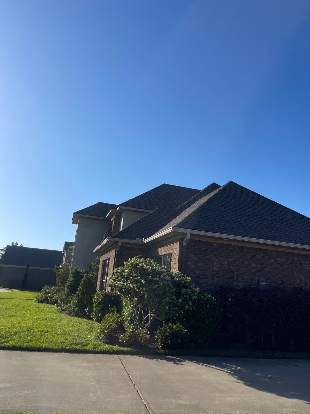 Residential Roofing Installation using Roof Replacement by American Roofing & Construction LLC