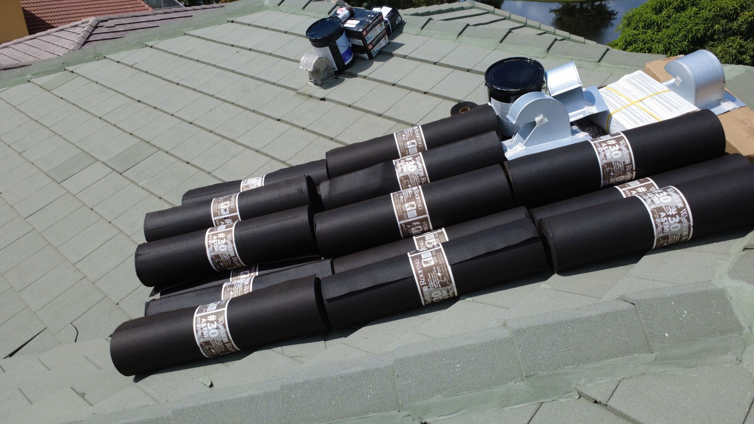 Residential Roofing Installation using 1" Nail strip metal roof by BLUES BROTHERS ROOFING