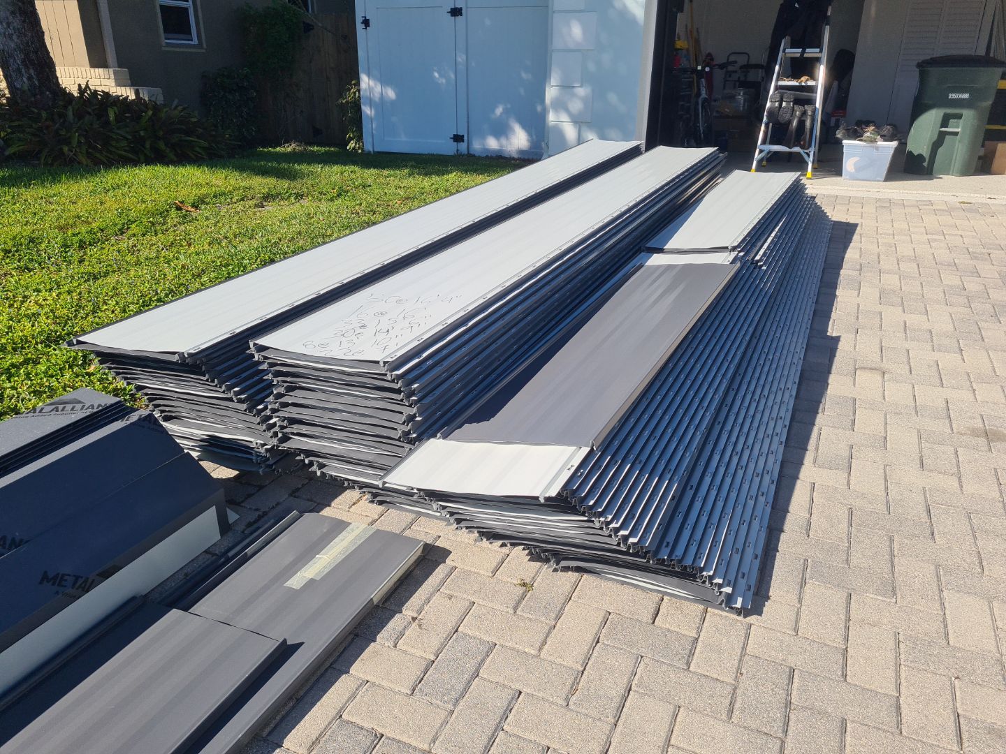 Residential Roofing Installation using 1" Nail strip metal roof by BLUES BROTHERS CONSTRUCTION CORP