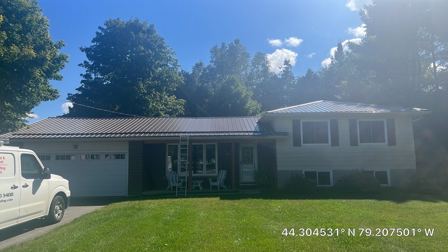 Residential Roofing Installation using 24 Ga Standing Seam Metal by Jay Carter Roofing & Sheet Metal