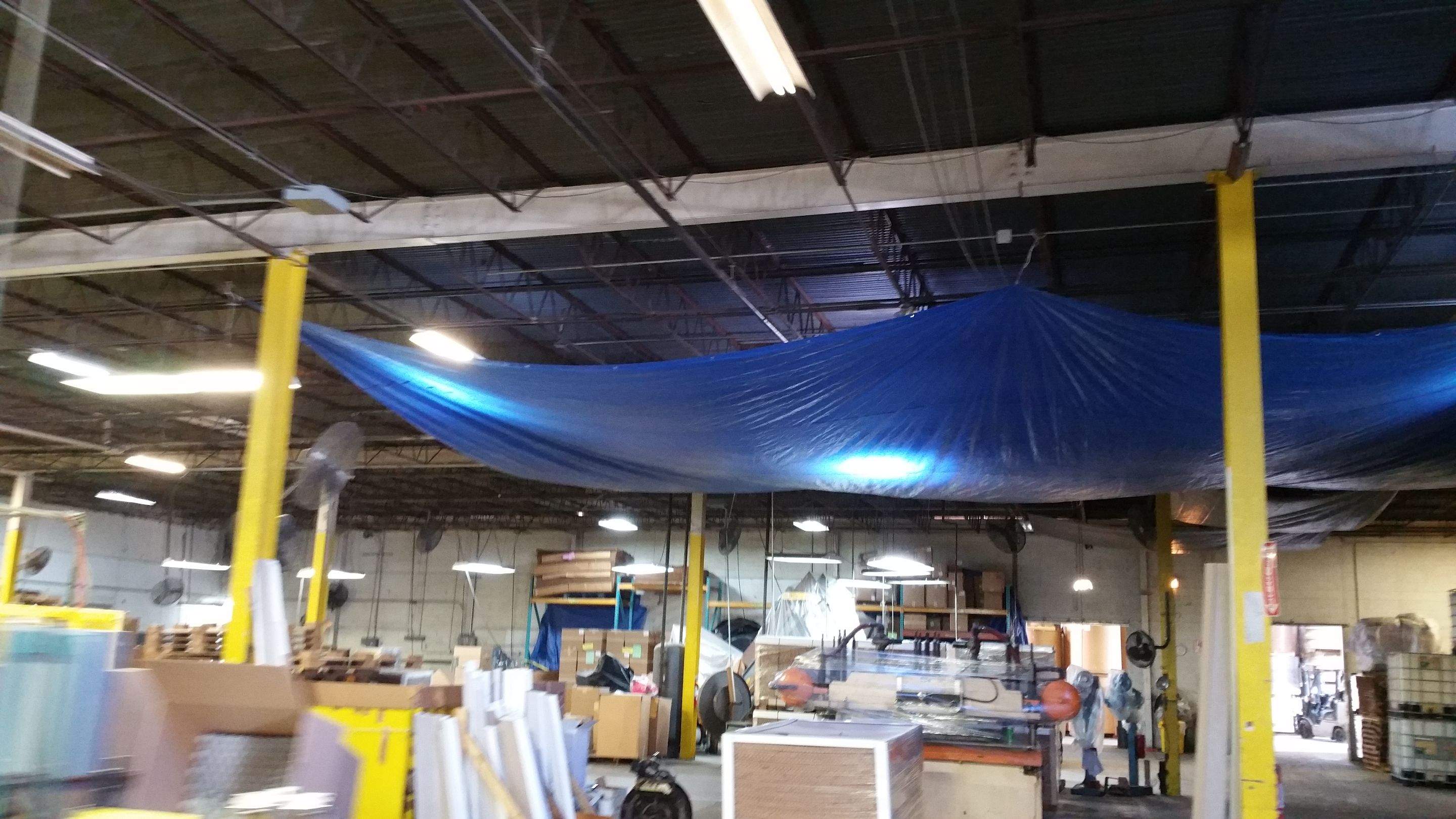 Massive Storm Damage Project - Factory in Arlington by First United Roofing & Construction