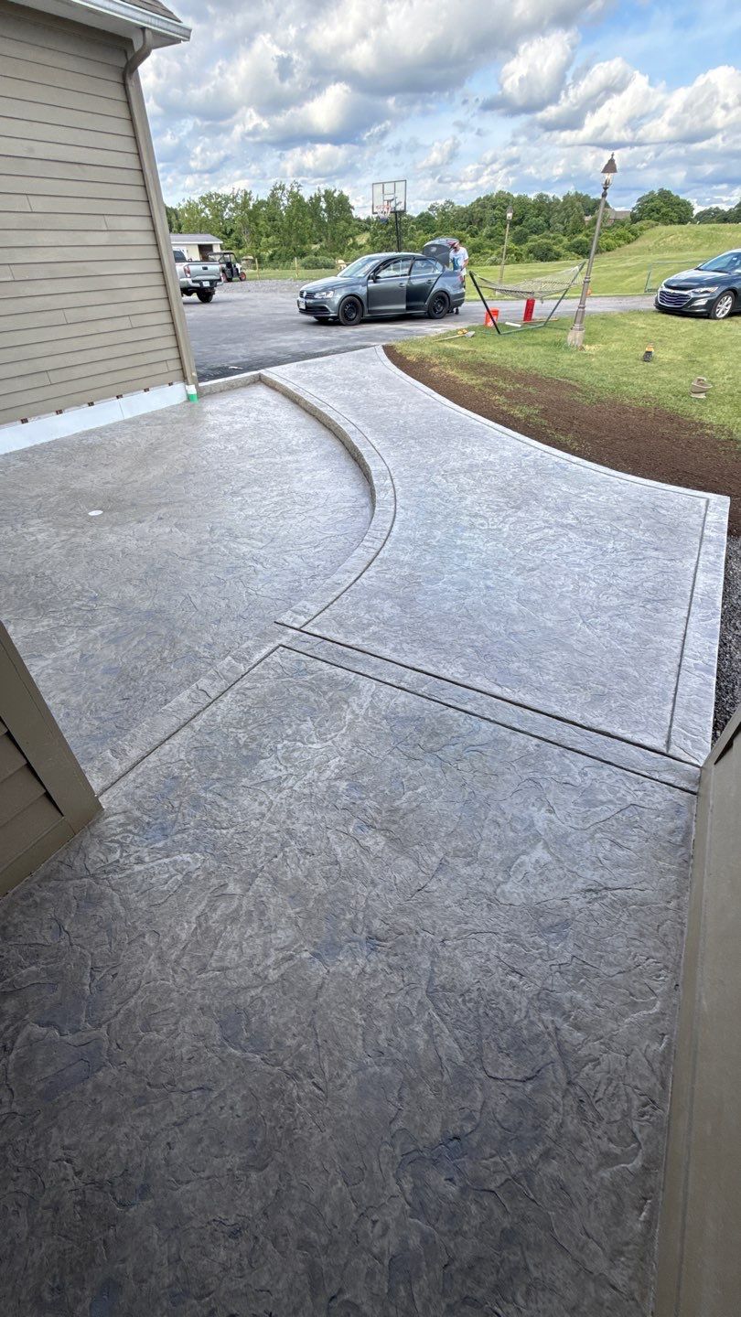 Oxford Slate Stamp Patio by NG Masonry & Construction LLC