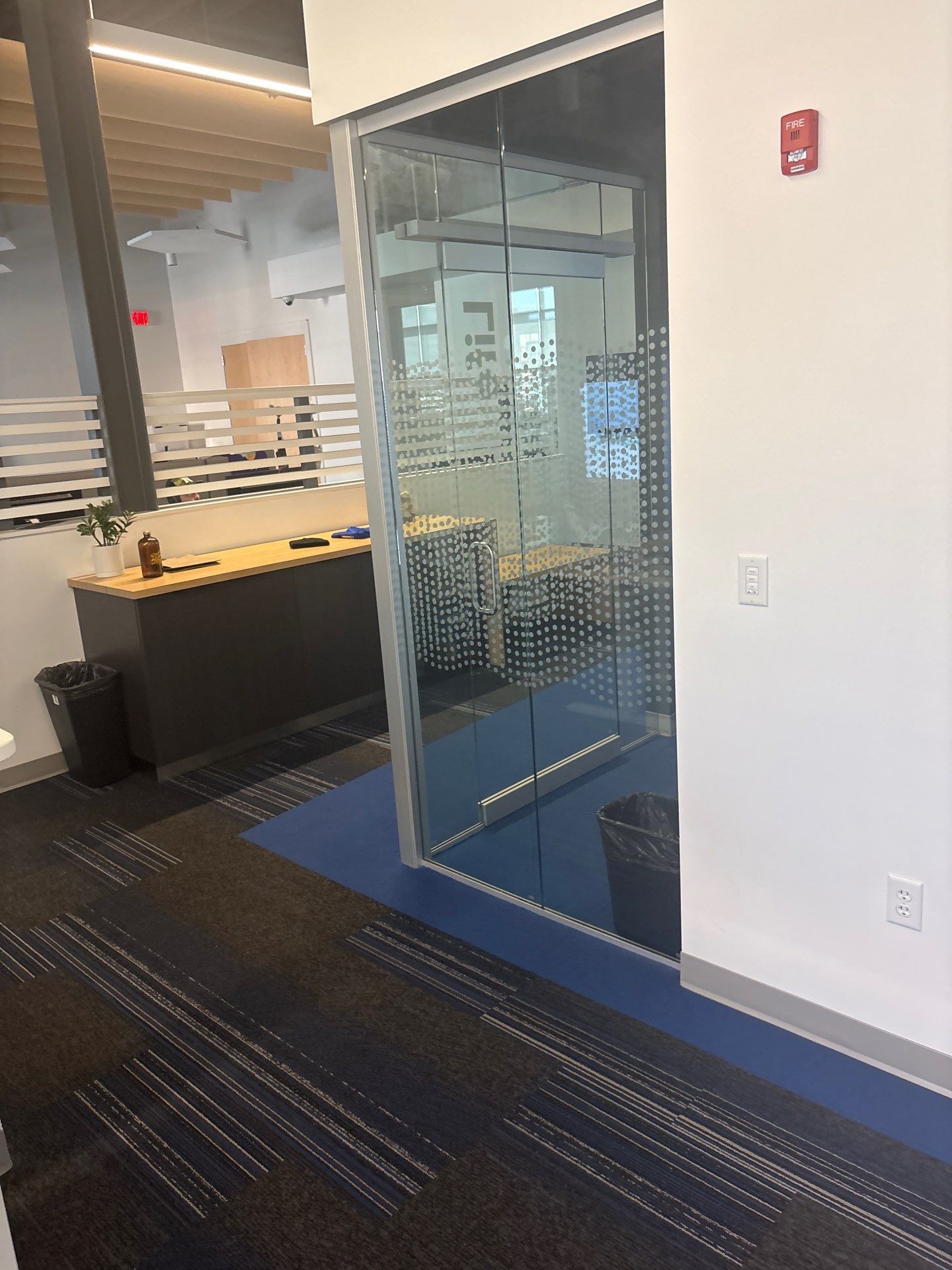 Lincoln Office Interior Remodel with Acoustic Baffles and Glass Walls by CompanyCam Sales Demo