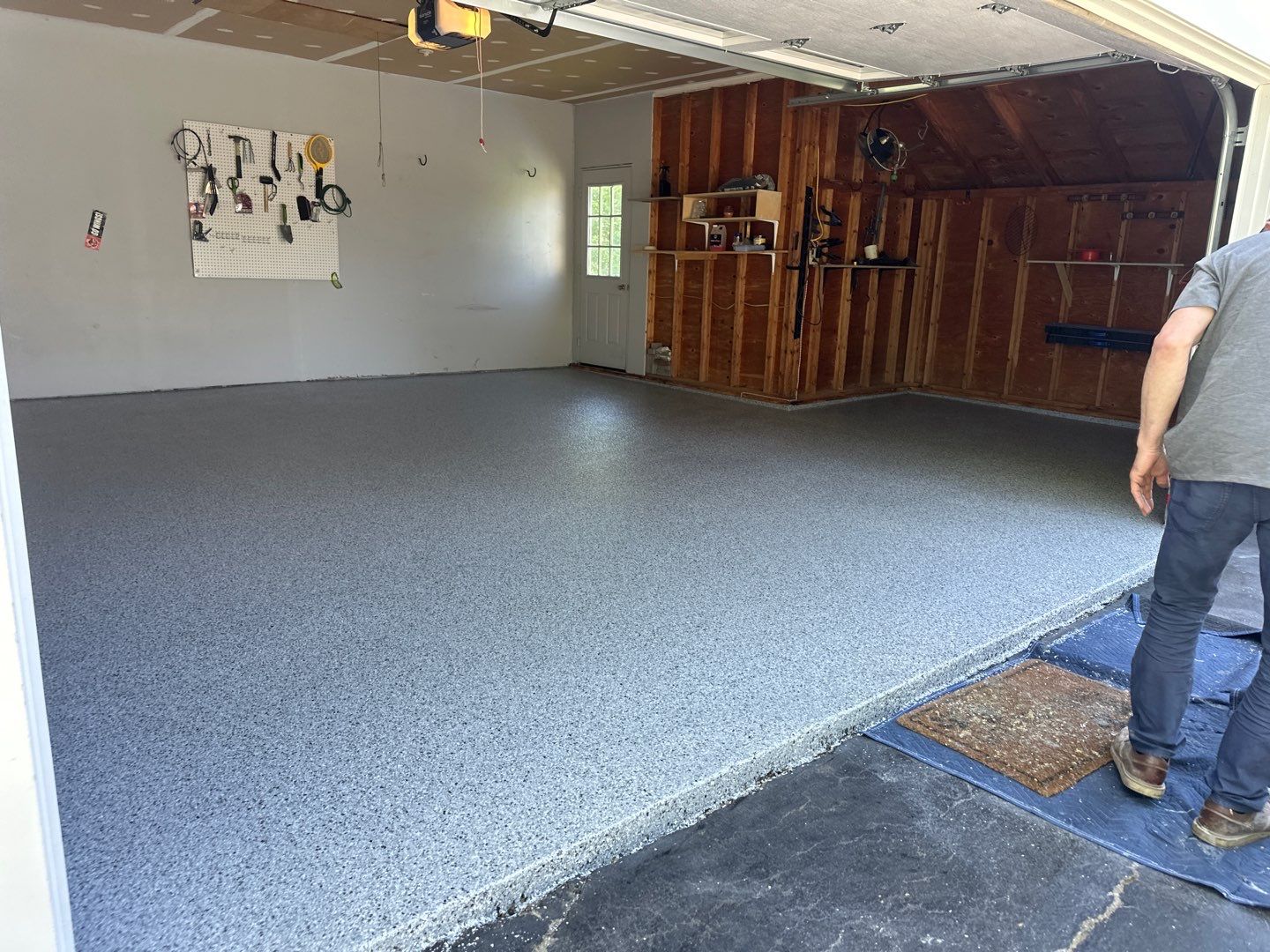 Silverado garage floor coating  by NG Masonry & Construction LLC