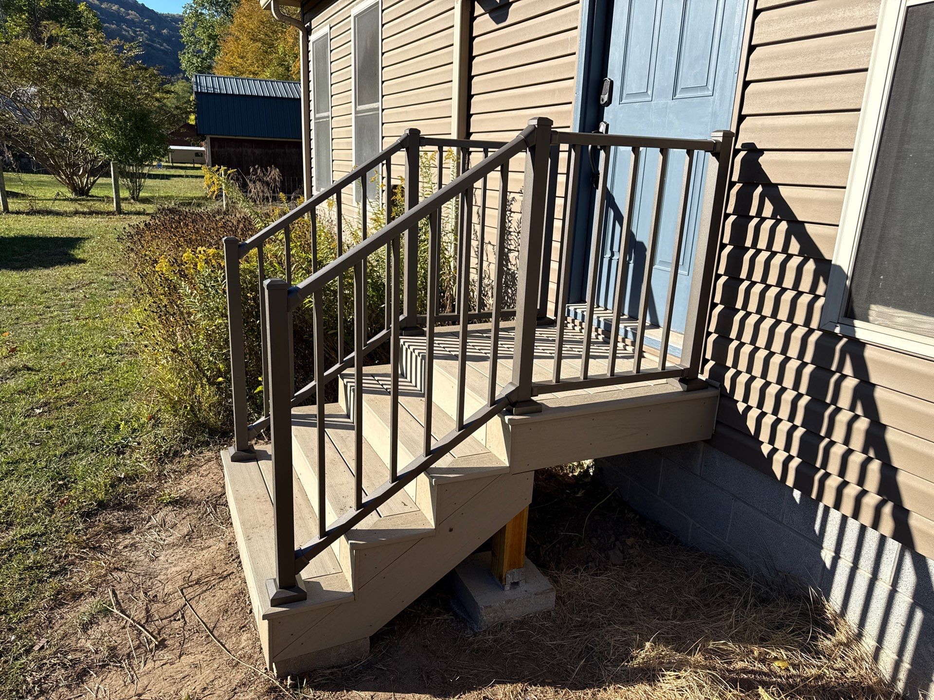 Custom Composite Deck and Screened Porch Addition in Hinton by Walnut Hollow Decks & Outdoor Living