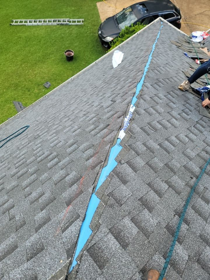 Residential Roofing Installation using Roof Replacement by American Roofing & Construction LLC