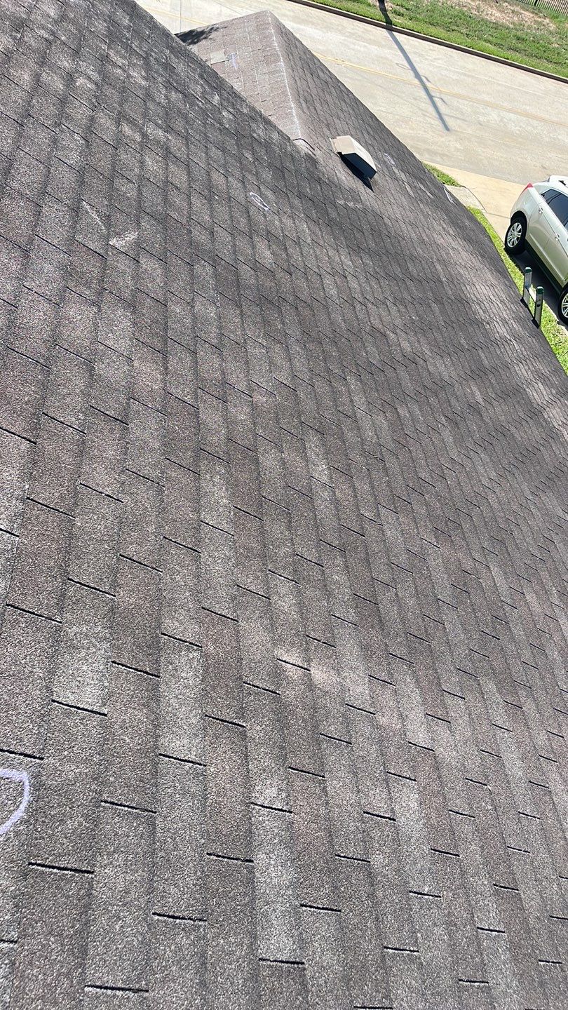 AMIG approved this roof for wind damage, fascia painting, and window work. by Roof Repair Company
