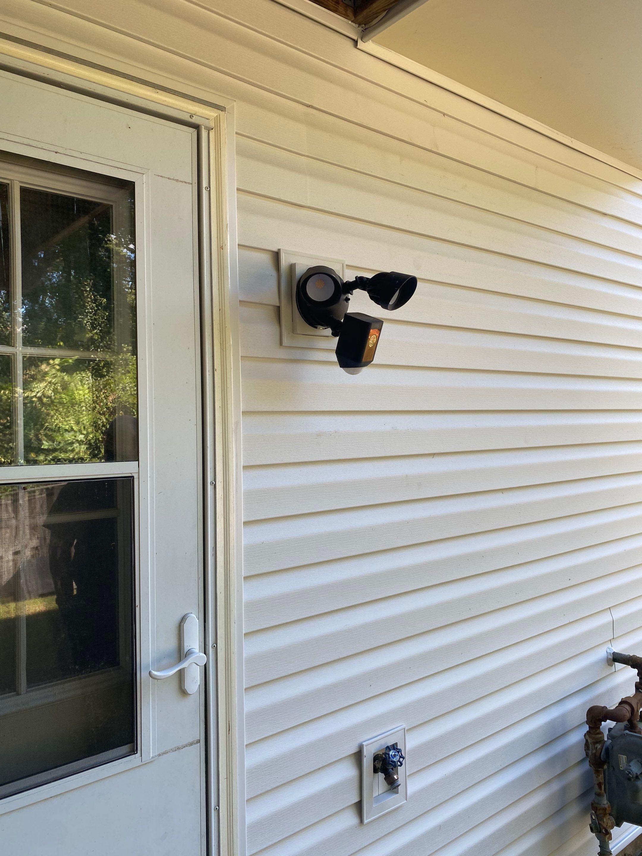 Woodbridge: Siding Replacement with Mastic Ovation Vinyl siding in Linen  by RM Banning, Inc.