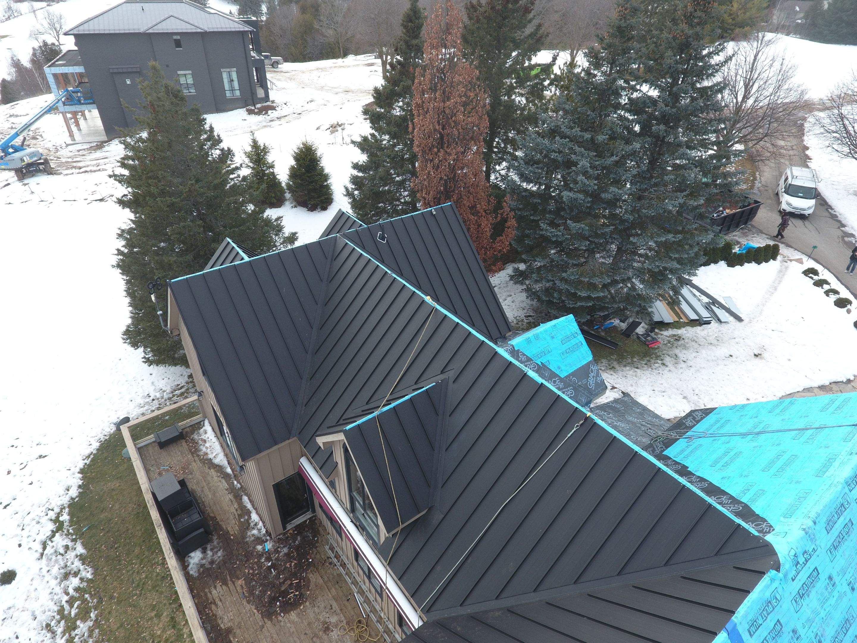 Residential Roofing Installation using 24 Ga Standing Seam Metal by Jay Carter Roofing & Sheet Metal