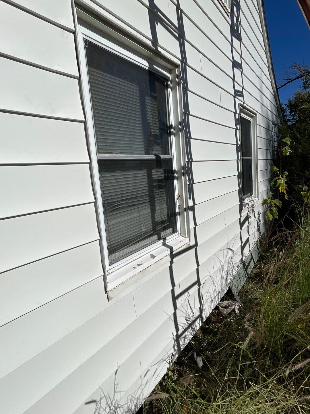 Residential Roofing Installation using Tamko Titan and aluminum siding repair by Storm Contracting 