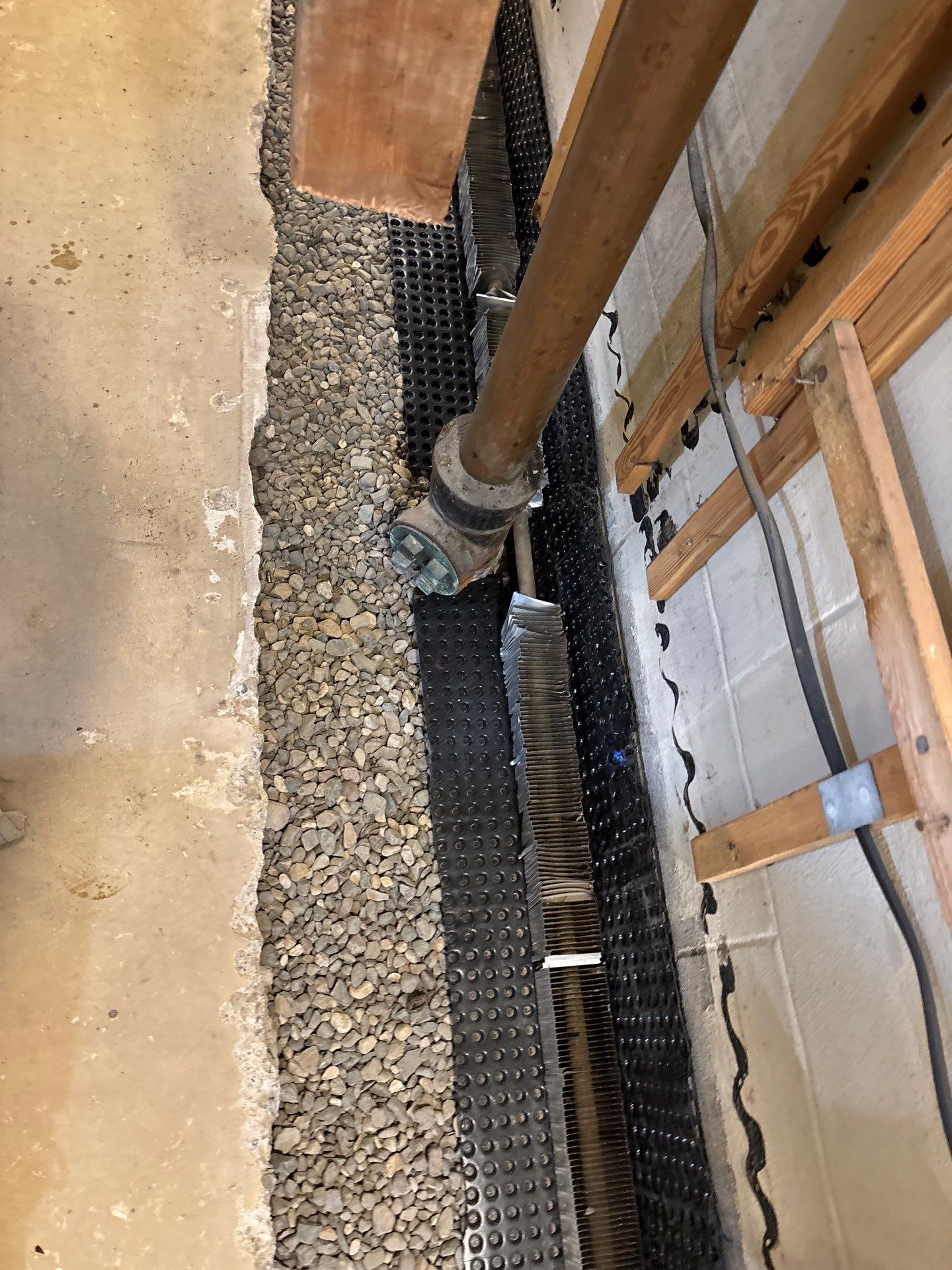 Drain Tile, Sump Pump & Buried Discharge in Columbia Heights by Waterproofing Northeast