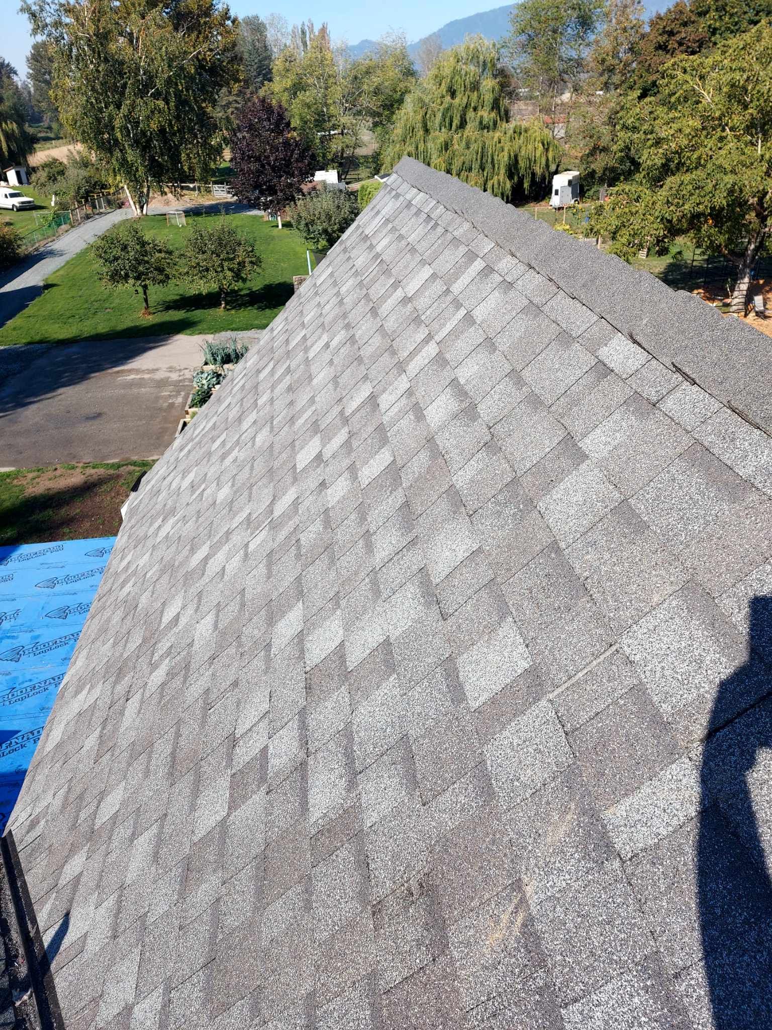 Residential Roofing Installation by Top Notch Roofing Inc