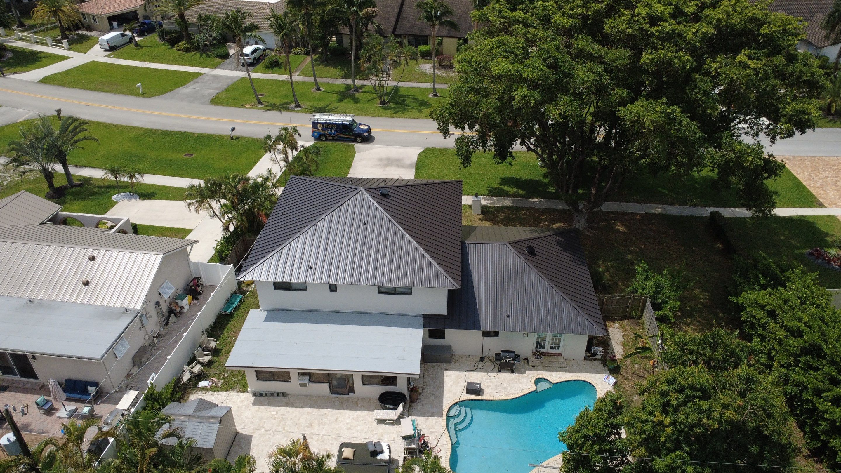 Residential Roofing Installation using 1.5'' Mechanical Seam by BLUES BROTHERS ROOFING