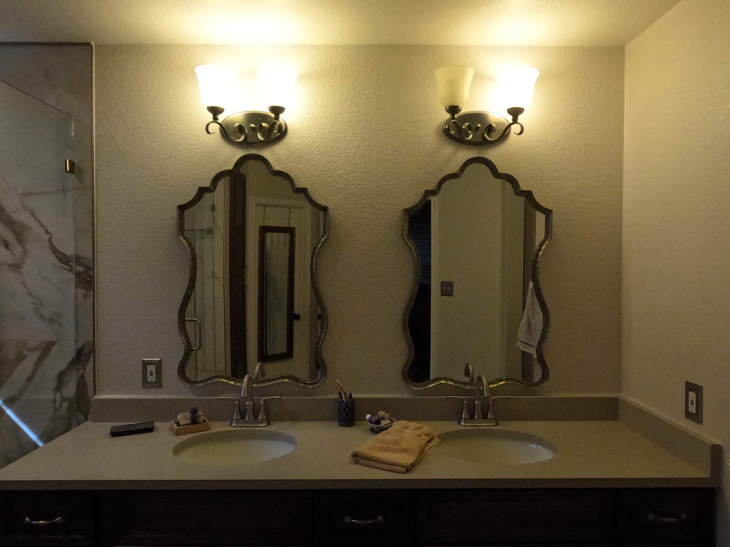 Master Bathroom Renovation Featuring Marble-Look Tile and Quartz Countertops by Mena stone surfaces