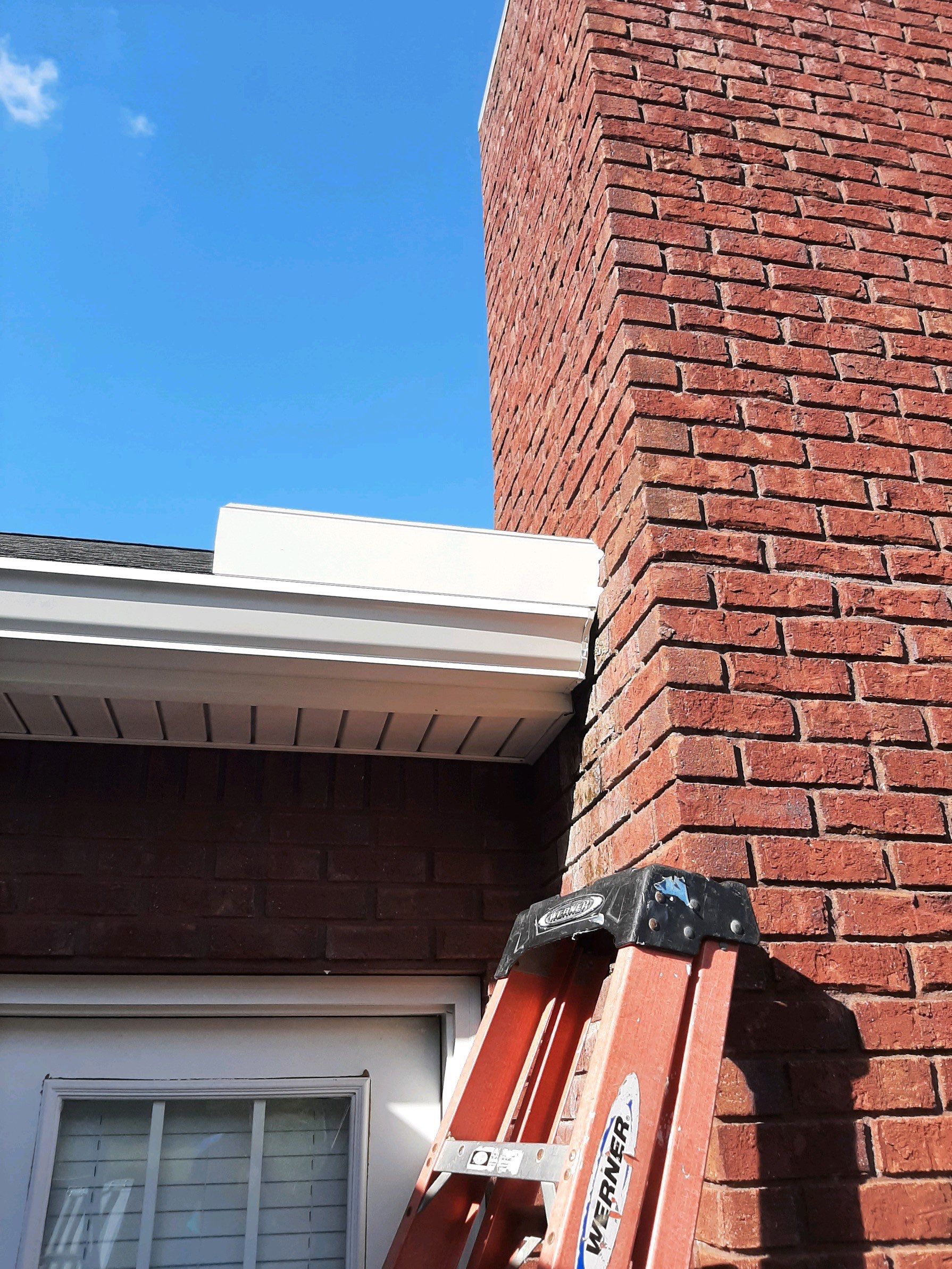 Gutter Installation using White K-Style Seamless Gutters by Gutter Professors