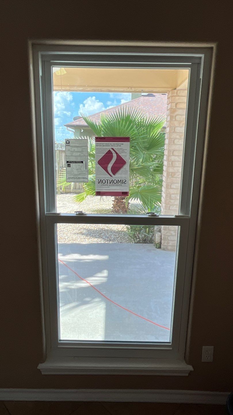 Curved Trim Windows by Bayfront Roofing and Construction