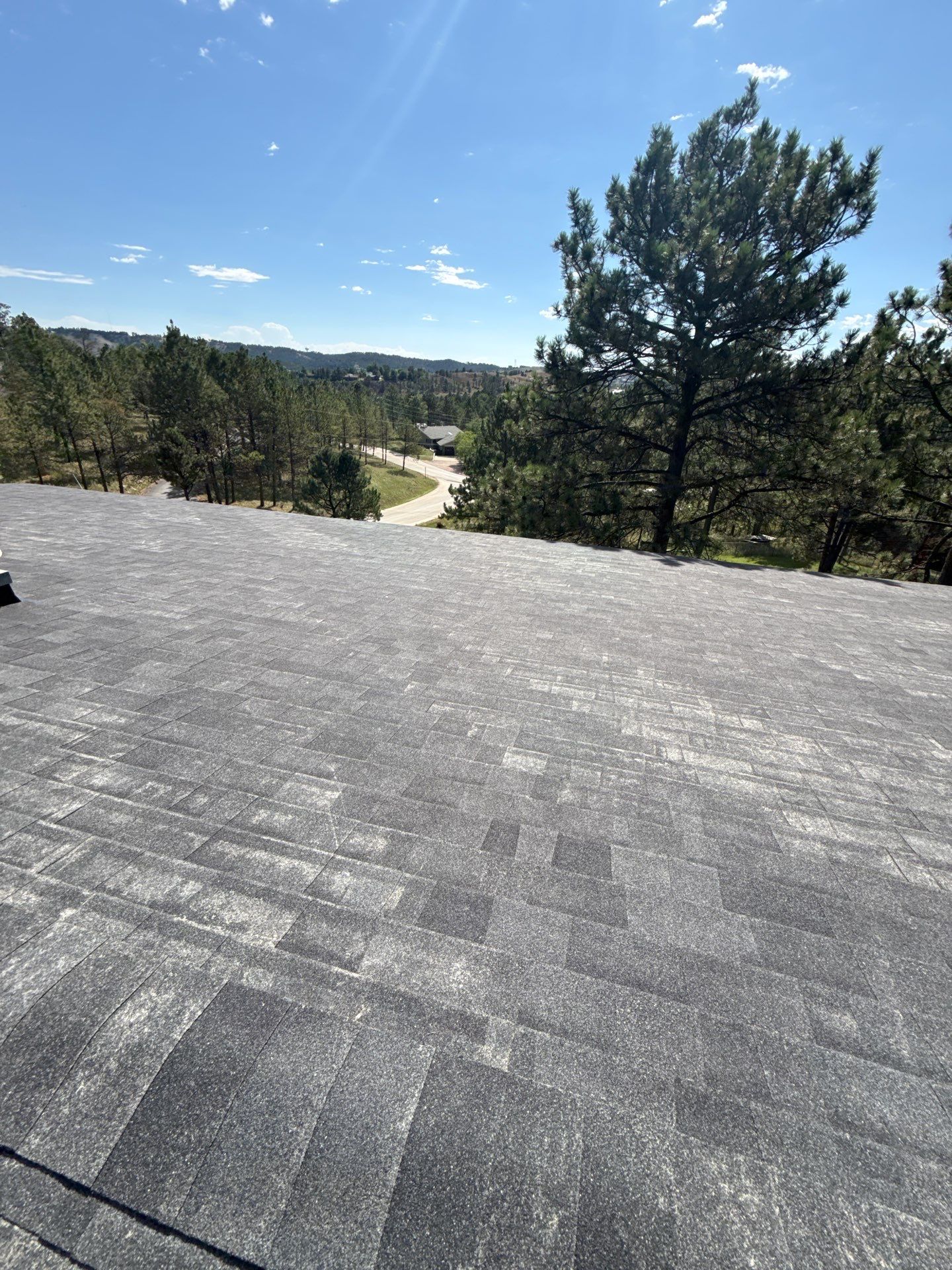 Full Architectural Shingle Installation for Contemporary Rapid City Residence by Weather-Tite Exteriors LLC