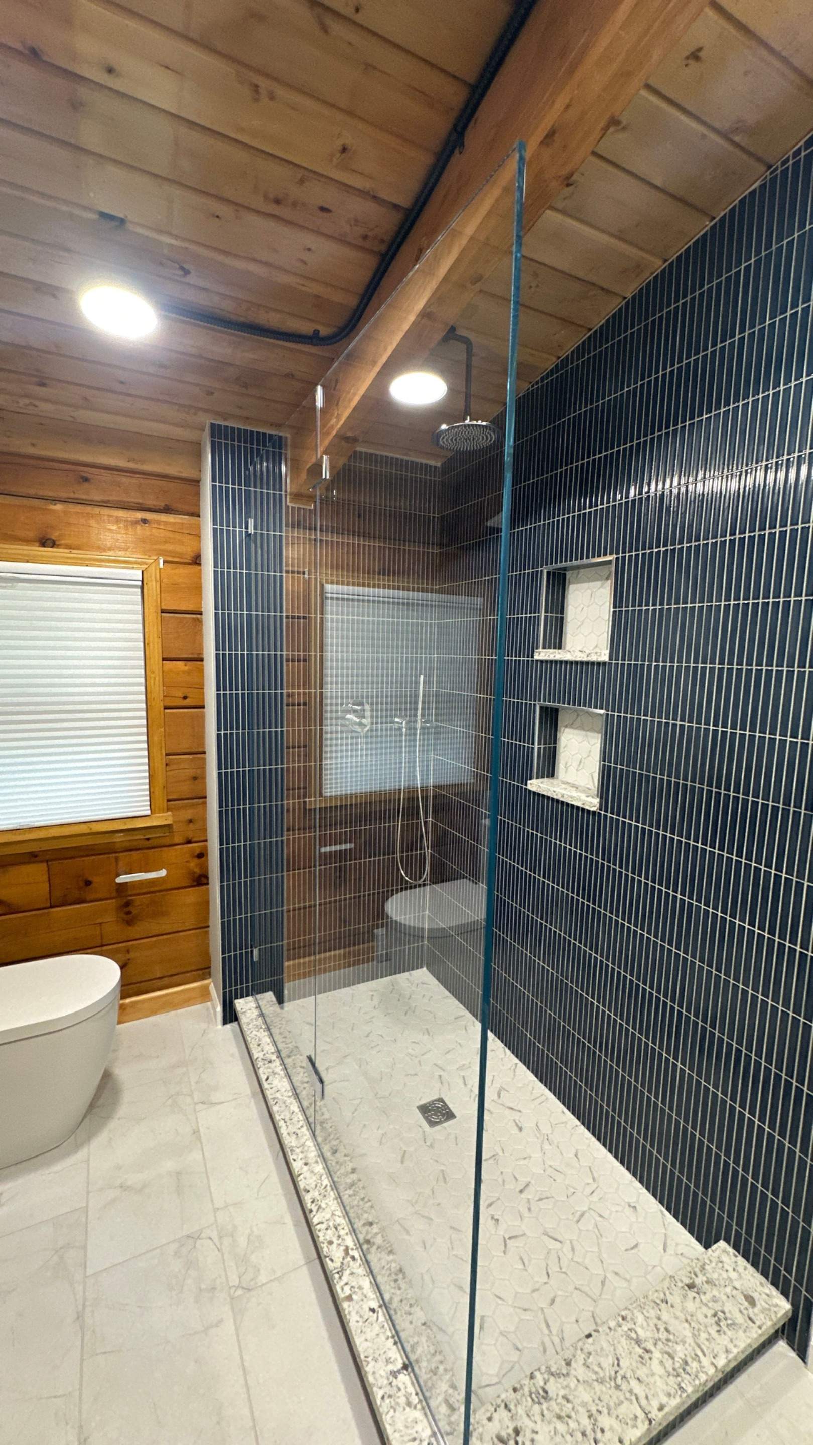 Brandt Double Bathroom Remodels by Integrity Tile and Home LLC