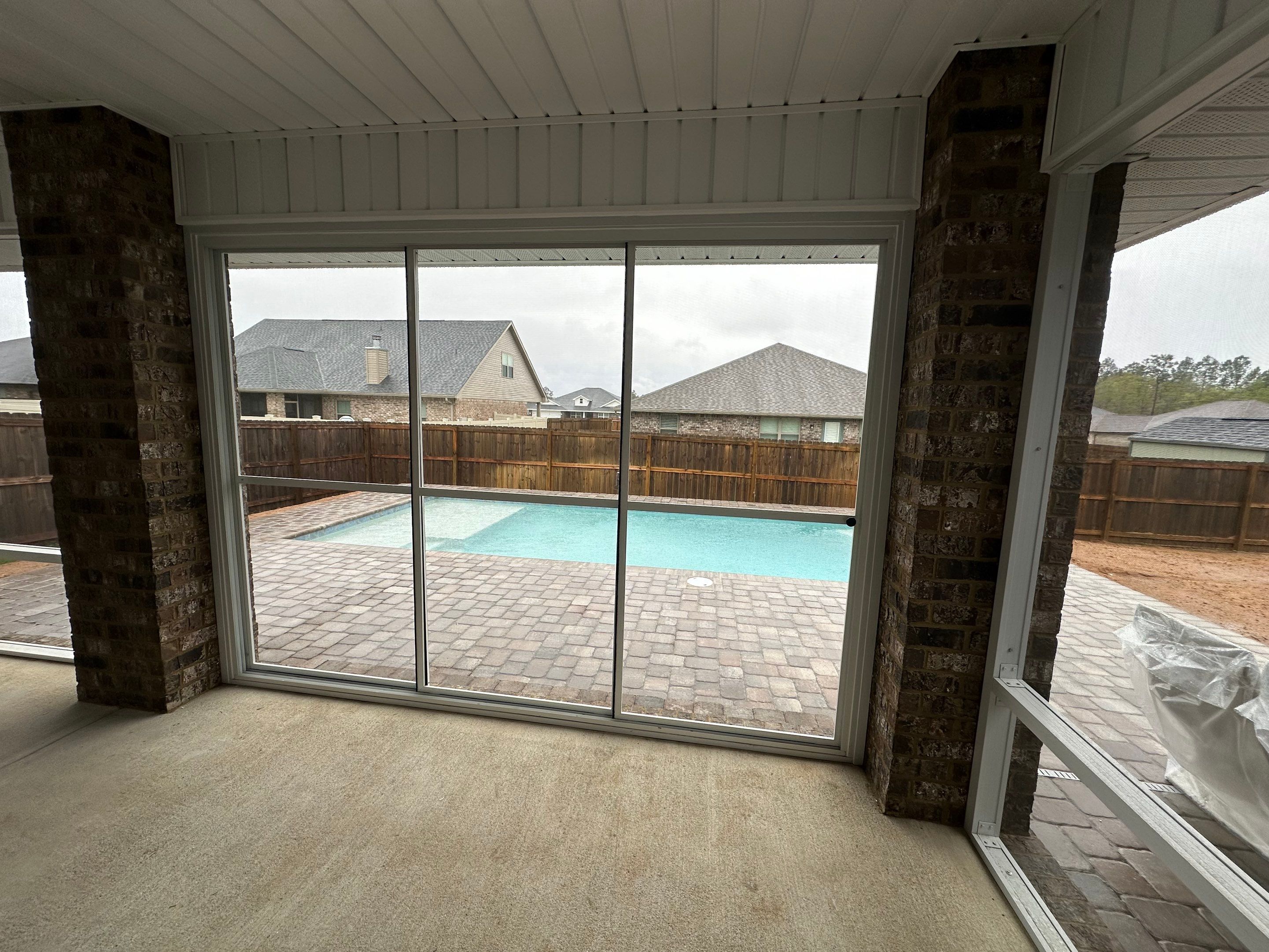 Poolside Screen Room Under Existing Patio Cover by Titan Sunrooms