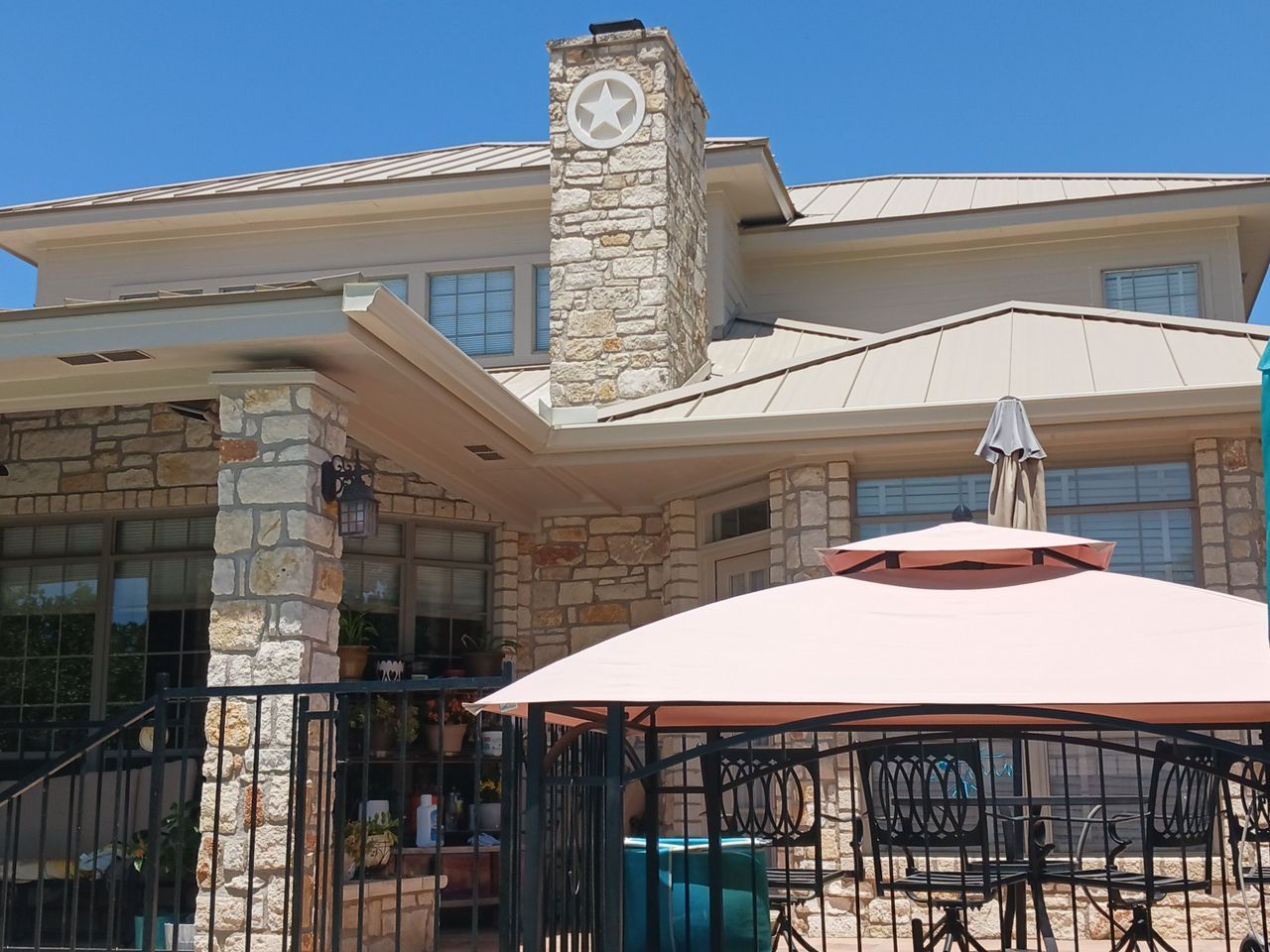 Residential Roof Replacement using 24 GA Double-Lock - Surrey Beige by Action Exteriors Austin