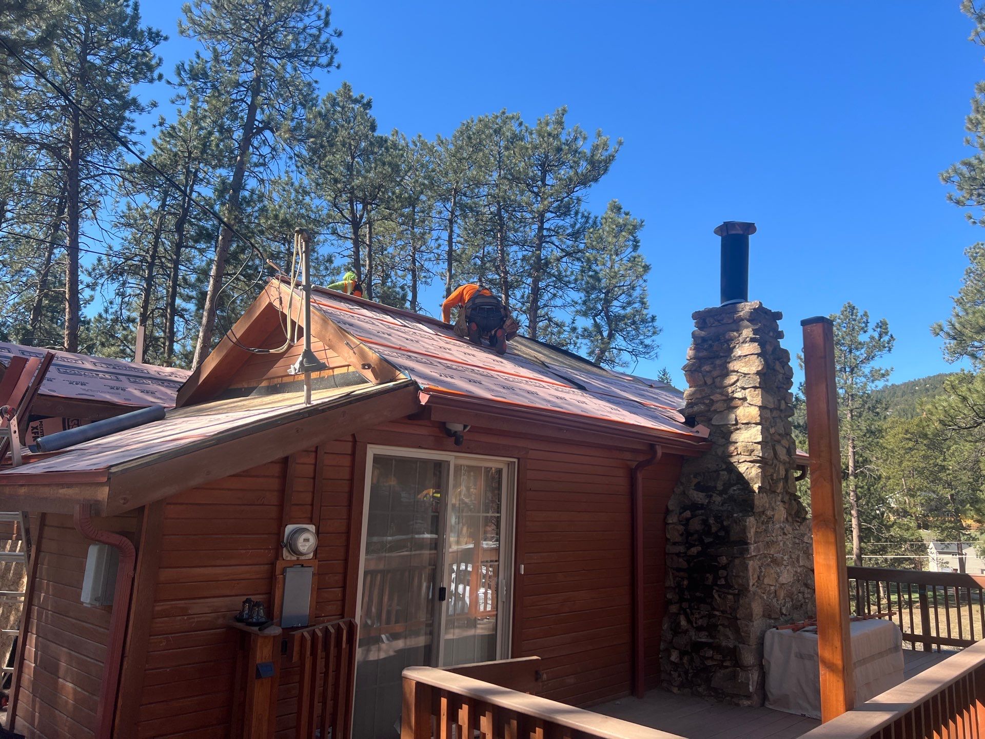 Residential Roofing Installation using Standing Seam Metal by Blue Peaks Roofing LLC 