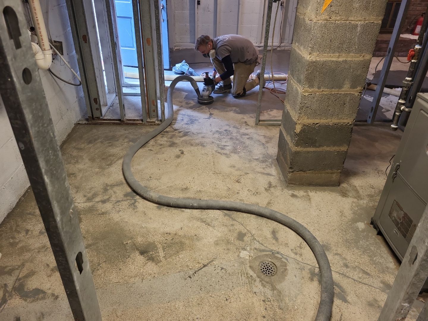 Basement Concrete Floor Coating with Penntek Flake System by Spectrum Painting, LLC