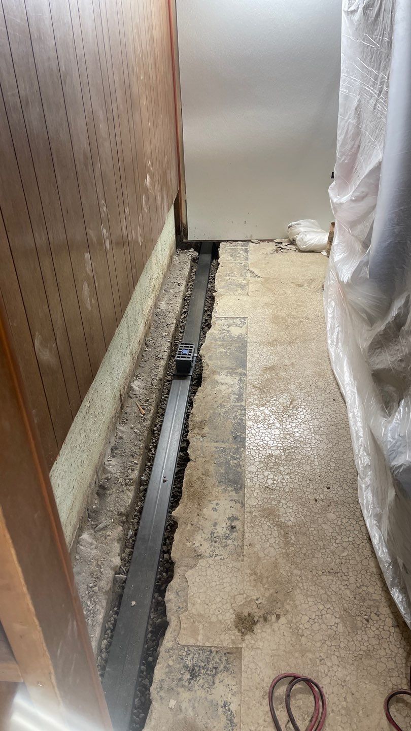 Interior Waterproofing Using GrateDrain™ Products by Toledo Basement Repair 
