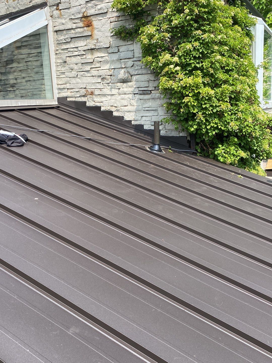 Roof Replacement using 16" Standing Seam Panels by Jay Carter Roofing & Sheet Metal