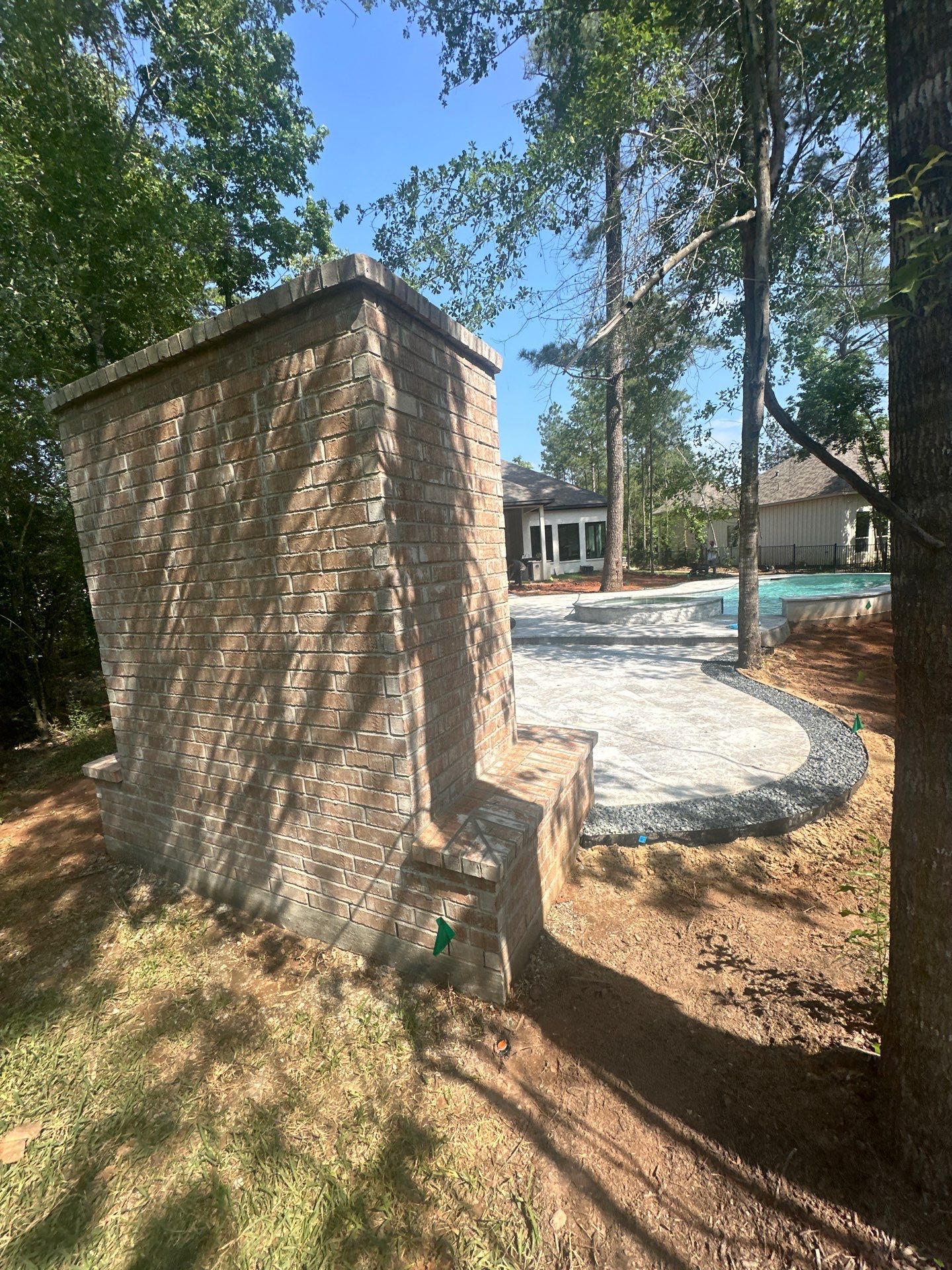 Outdoor Fireplace in Tomball, TX by SophAlx LLC