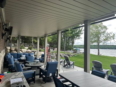 Custom Underdecking System and Outdoor Kitchen in East Jordan