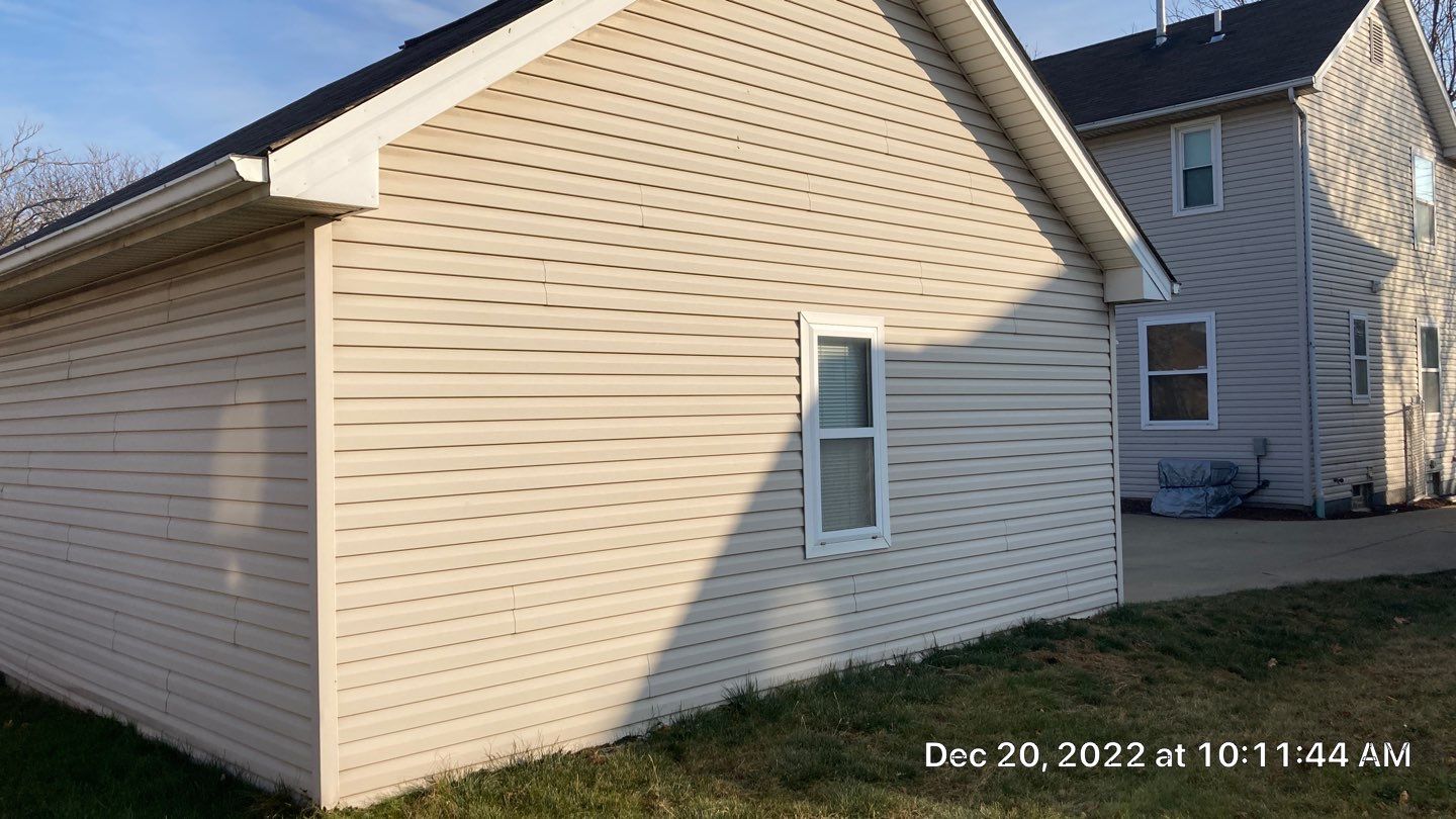 Wind damage to Siding: Insurance paid for full replacement of all siding by Absolute Roofing and Construction